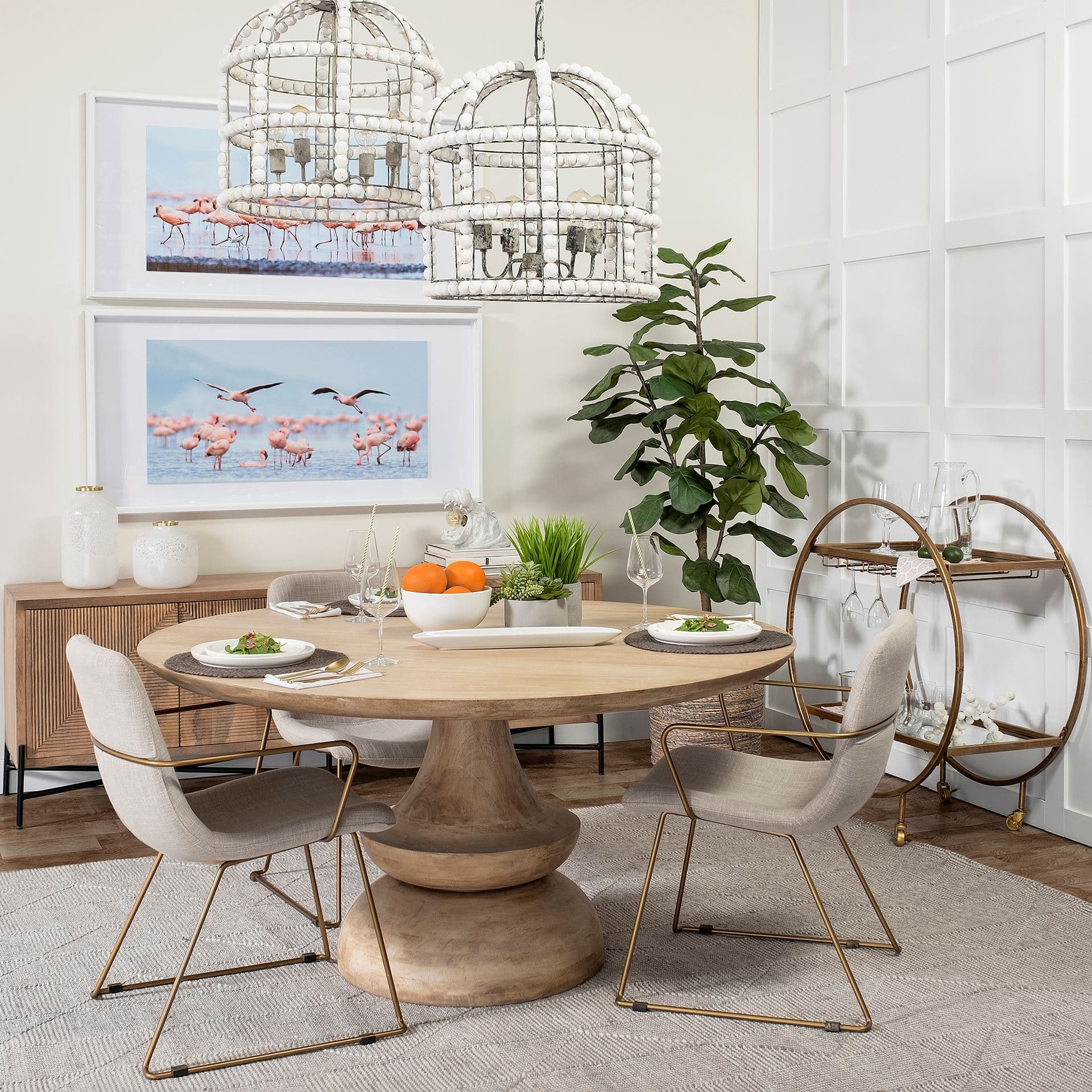 Carola Gold Frame Two-Tier Glass Shelves w/Stemware Holder Bar Cart — in a styled room