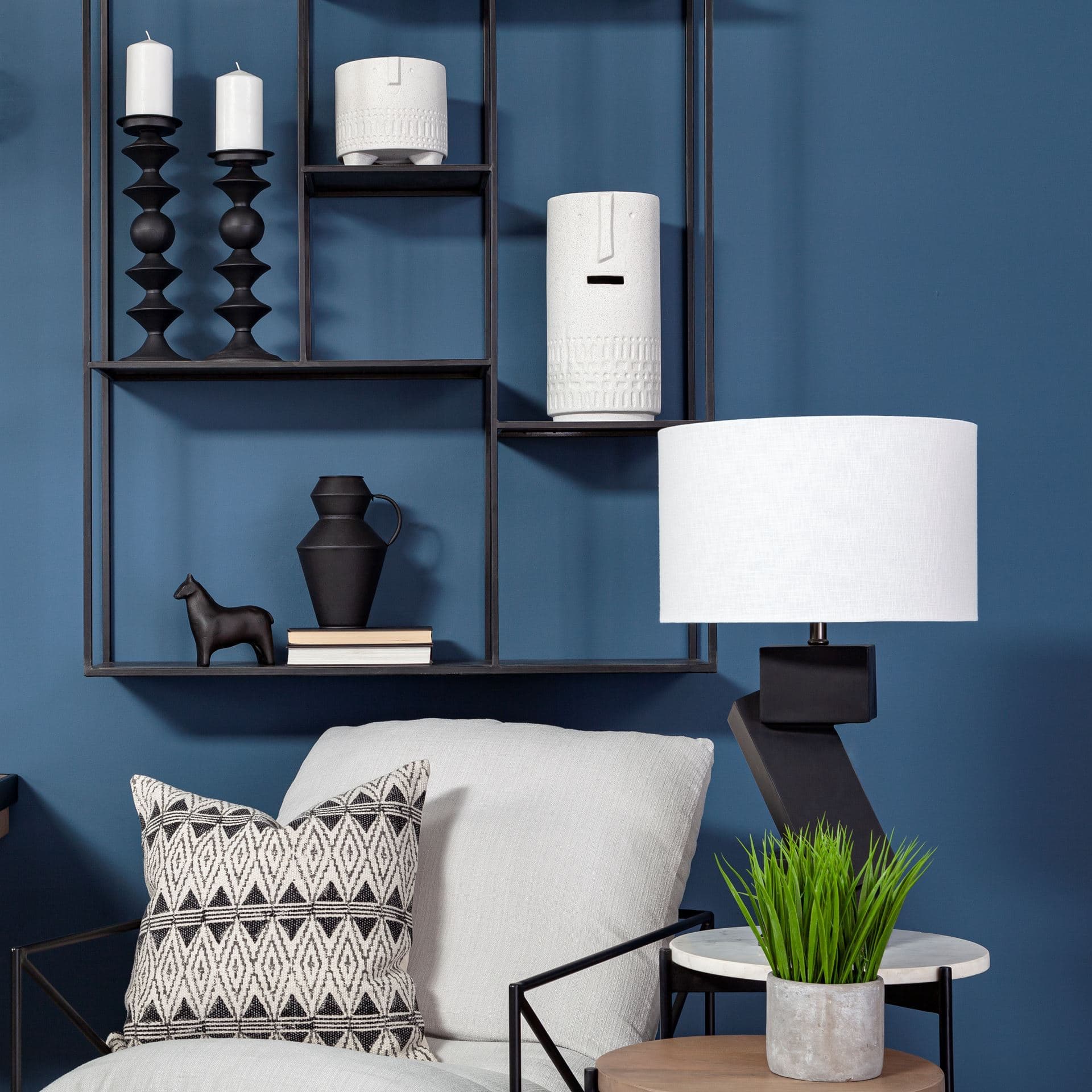 Candelero I Small Black Metal Grooved Table Candle Holder — in a styled room