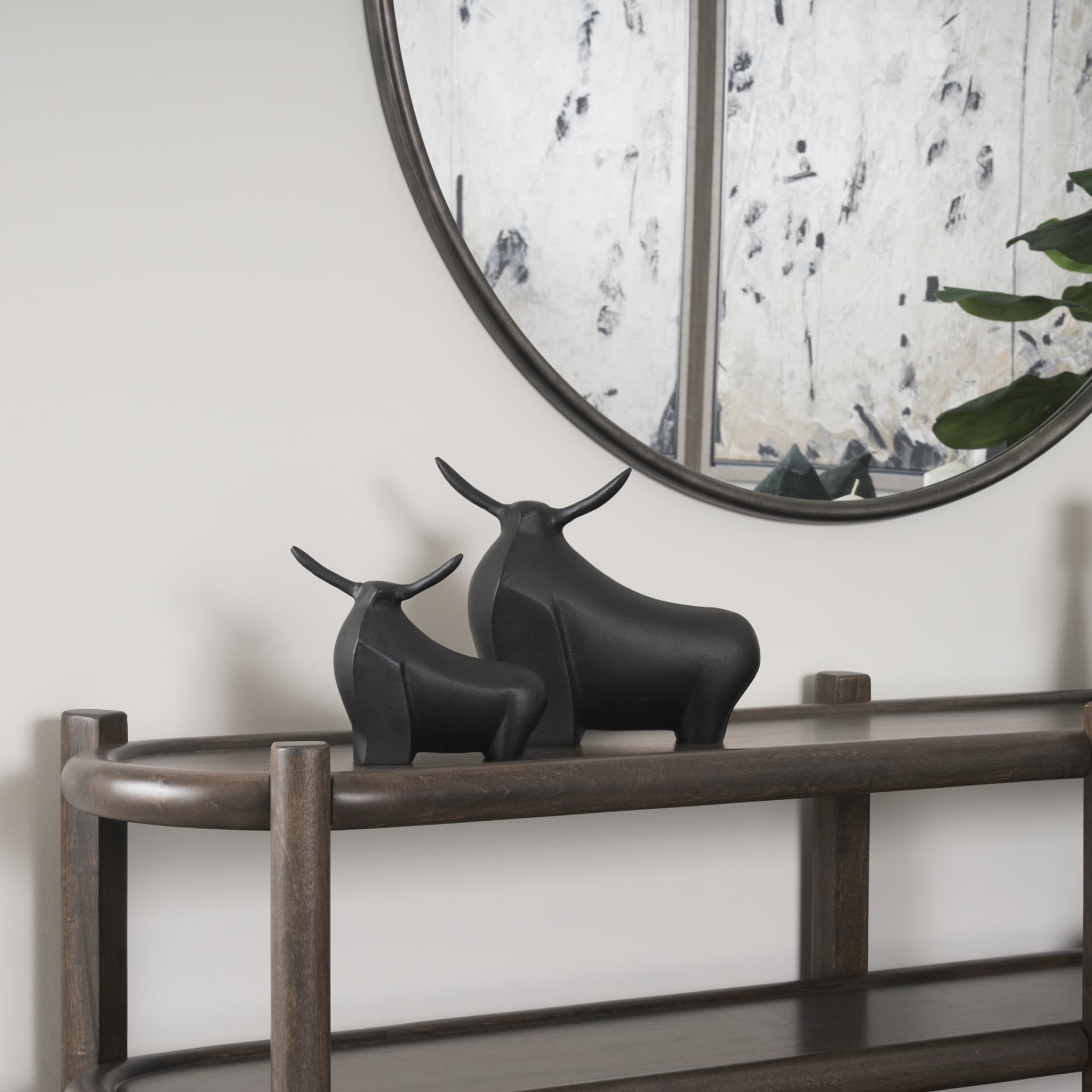 Radu Small Matte Black Metal Bull Decorative Object — in a styled room