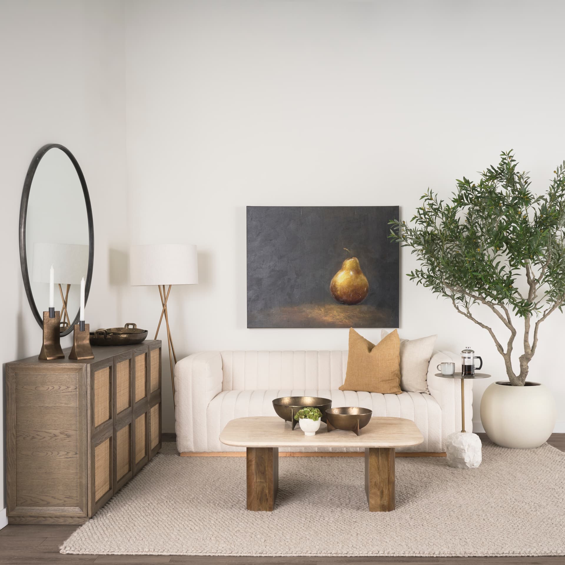 Symona Travertine and Mango Wood Rectangle Coffee Table — in a styled room