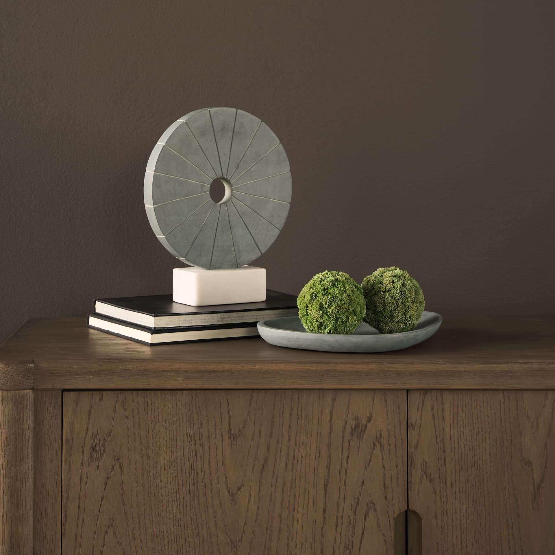 Orin Gray Marble Round Disc Decorative Object — in a styled room