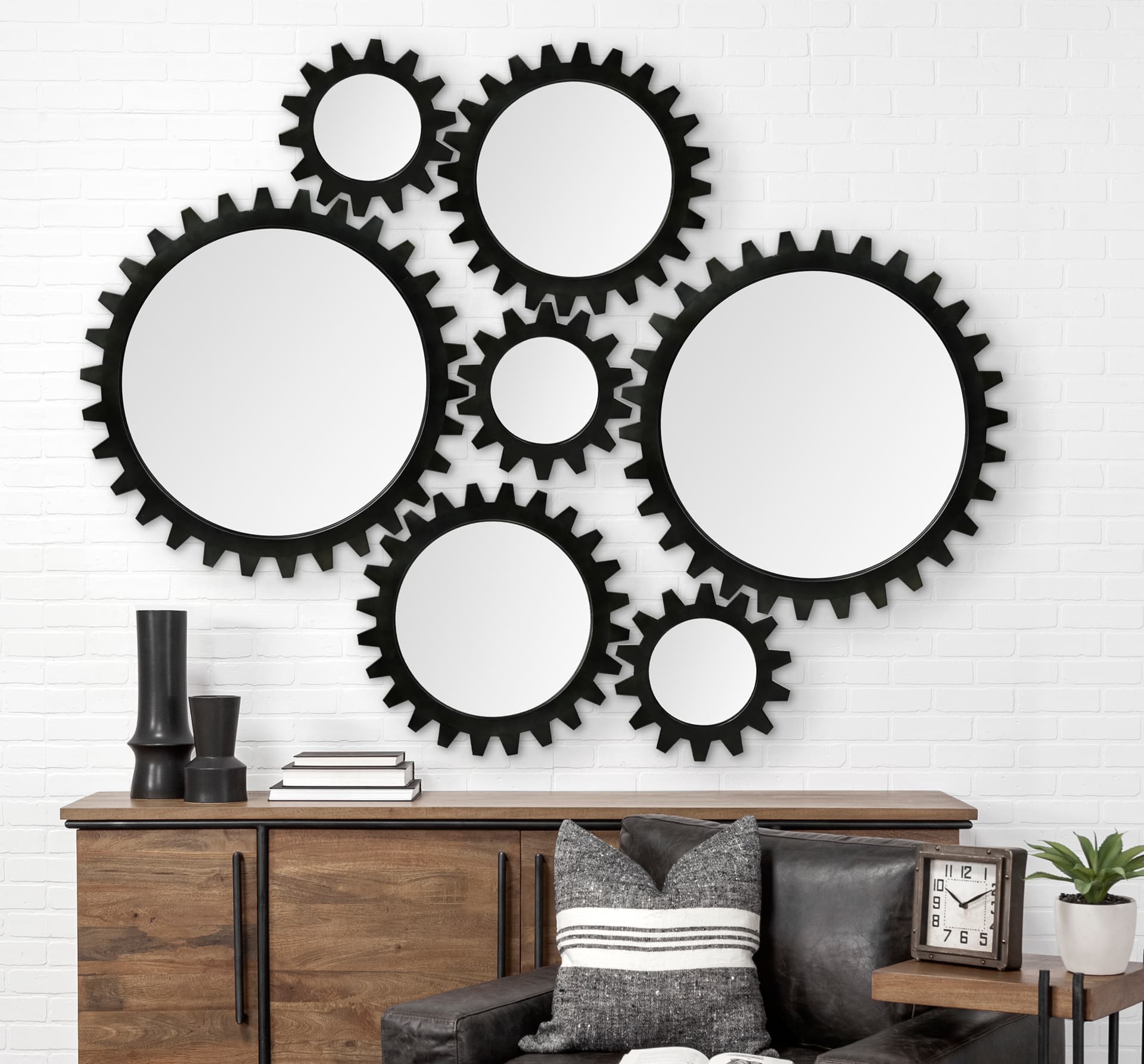 Alloy Cog 37" Round Black Metal Frame Mirror — in a styled room