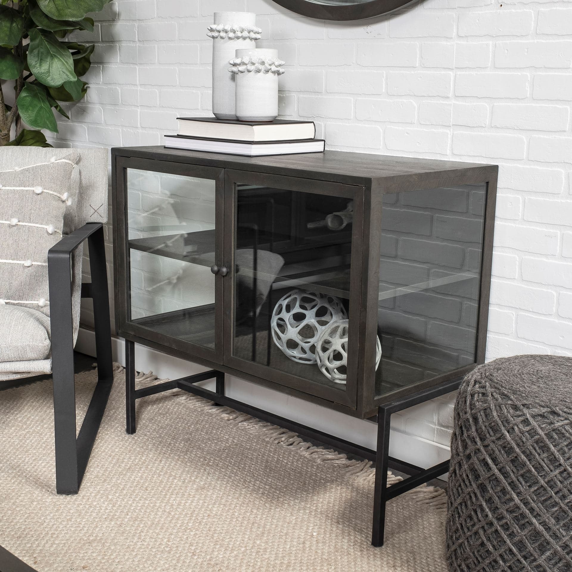 Arelius 36L x 18W Black-Brown Wood, Black Metal Base w/ 2 Glass Doors Accent Cabinet — product photograph