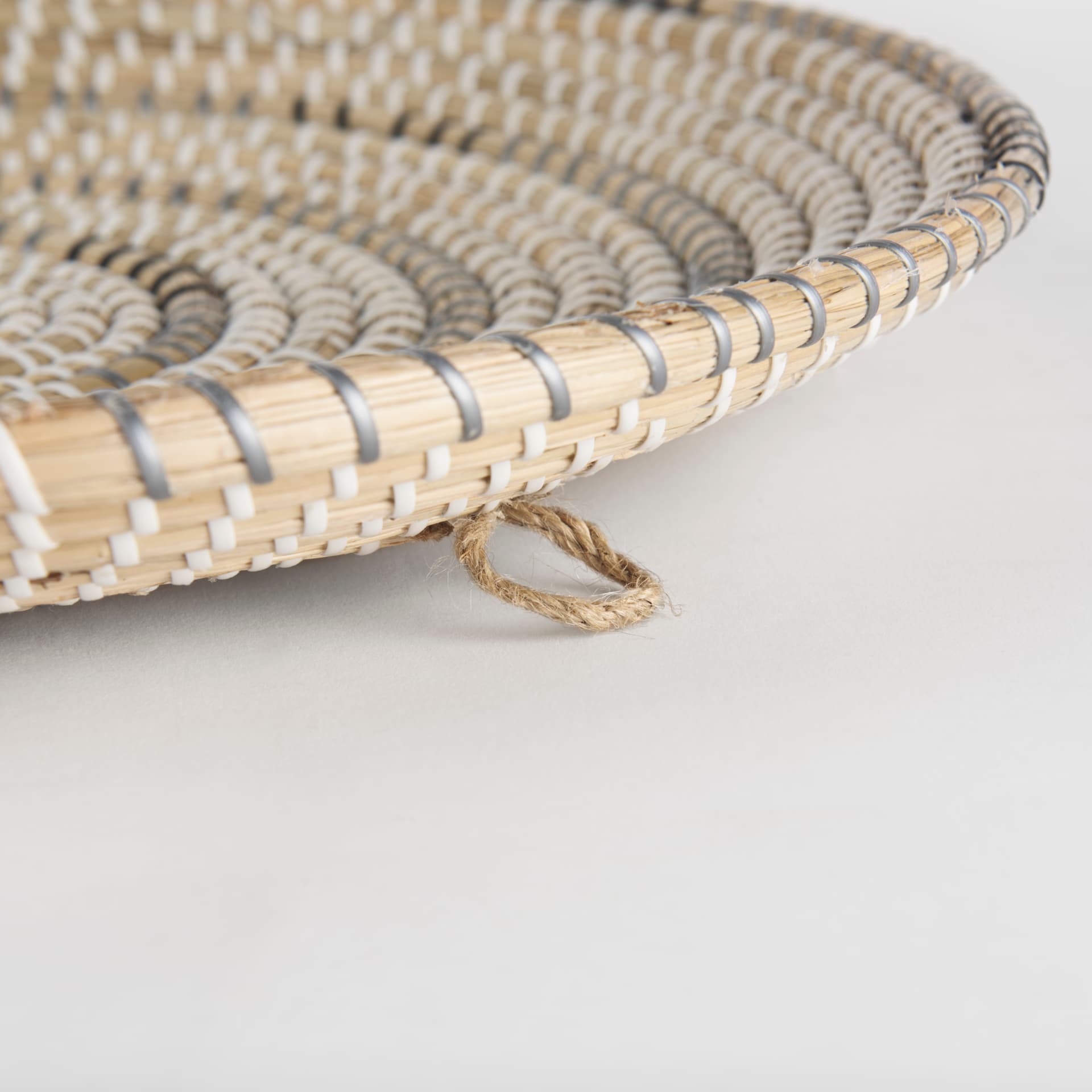 Avel 18.0L x 18.0W x 3.0H Light Brown Seagrass W/Dark Brown String Round Wall Hanging Plate — product photograph