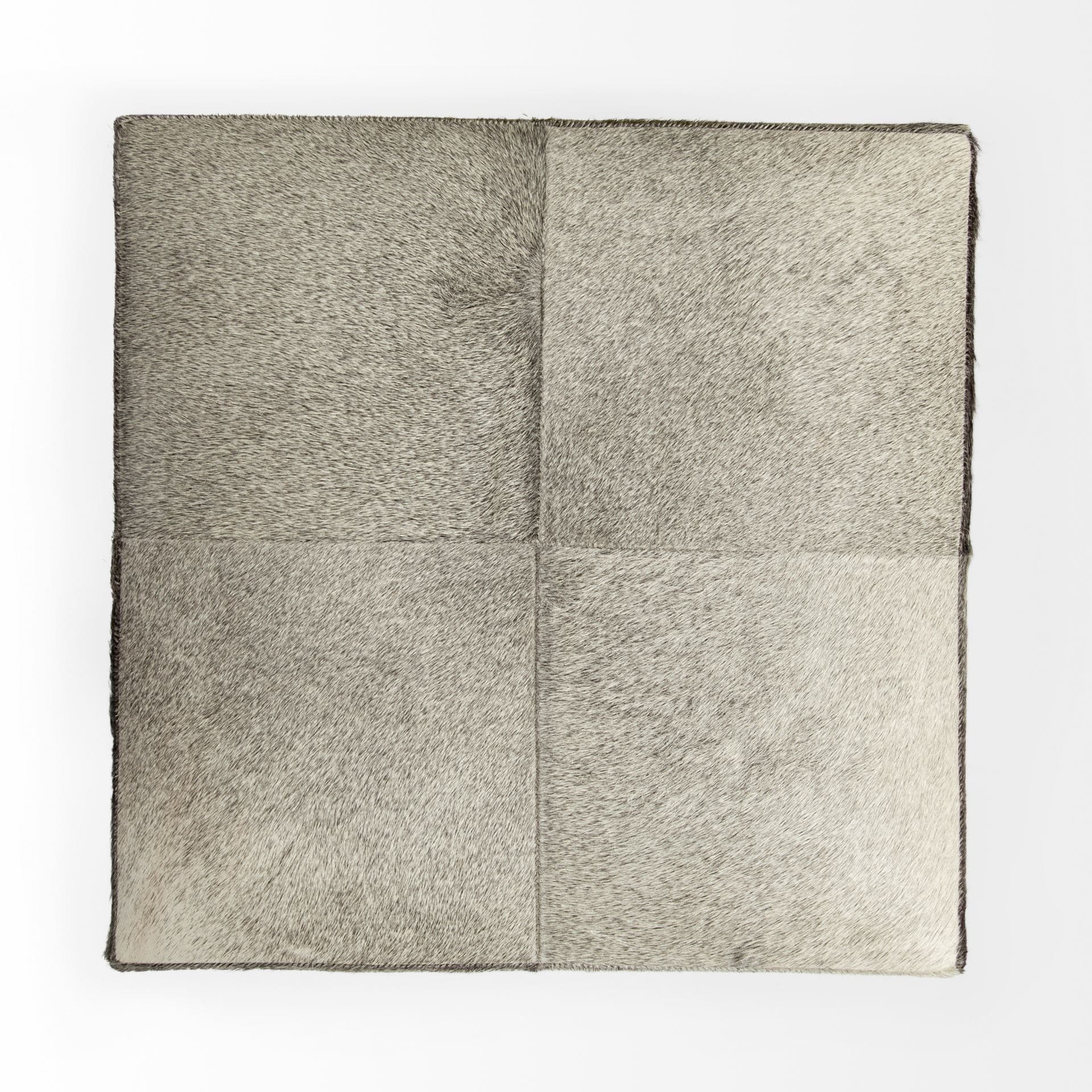 Zahavi I 20" Grey-toned hair-on-hide ottoman — product photograph