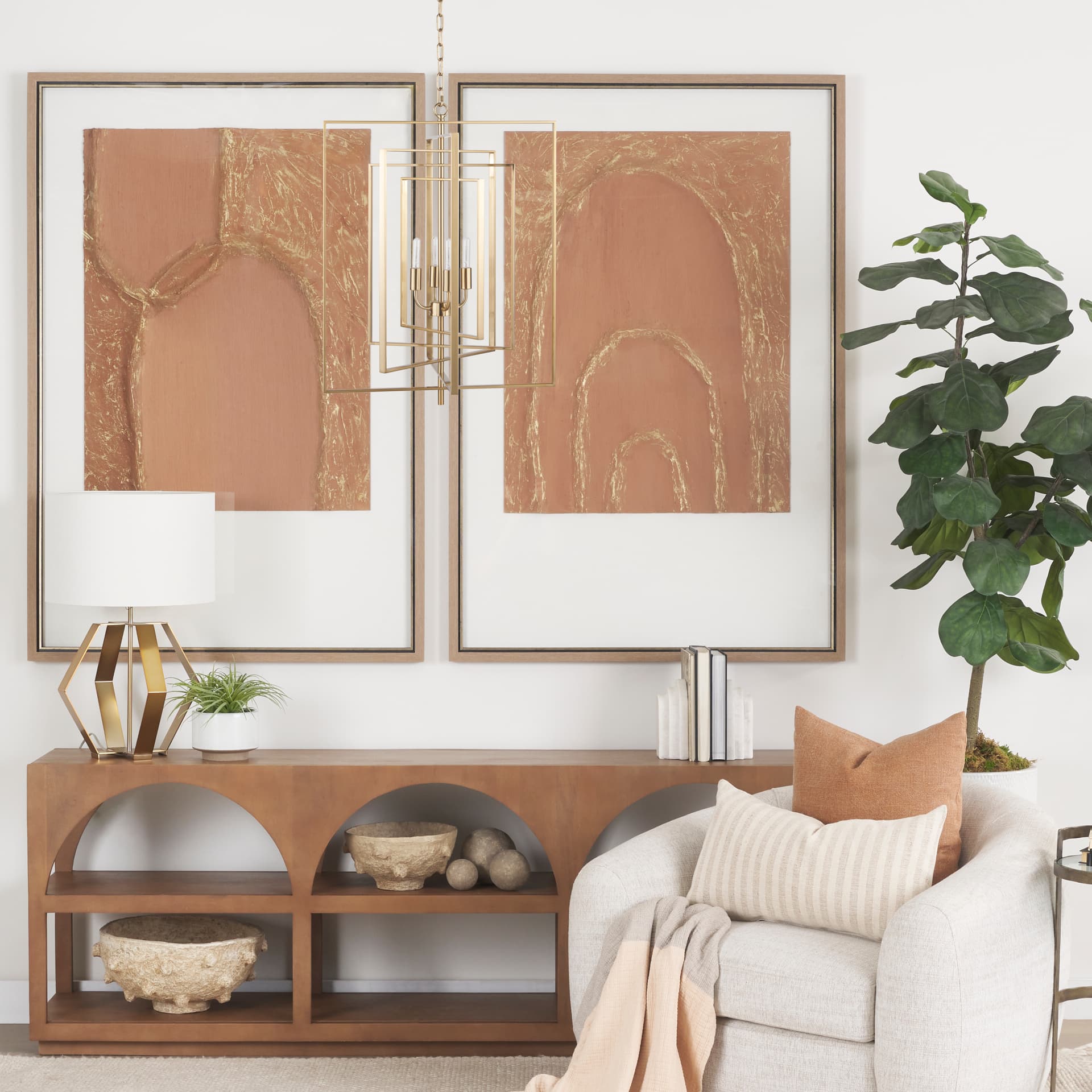Colleen Antiqued Gold Metal 4-Light Chandelier — in a styled room