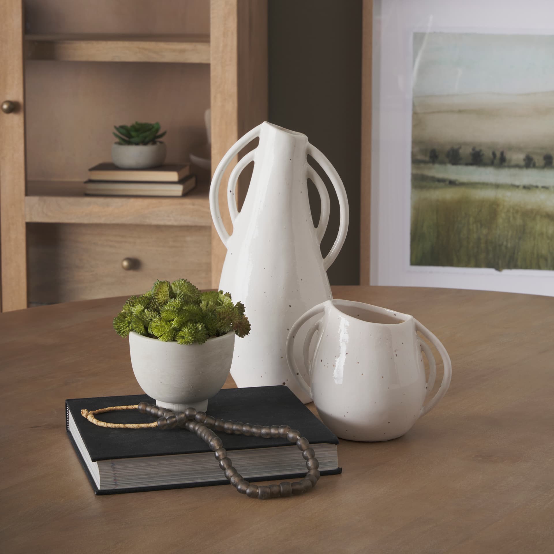 Urvi Tall Off White Speckled Asymmetrical Ceramic Vase — in a styled room