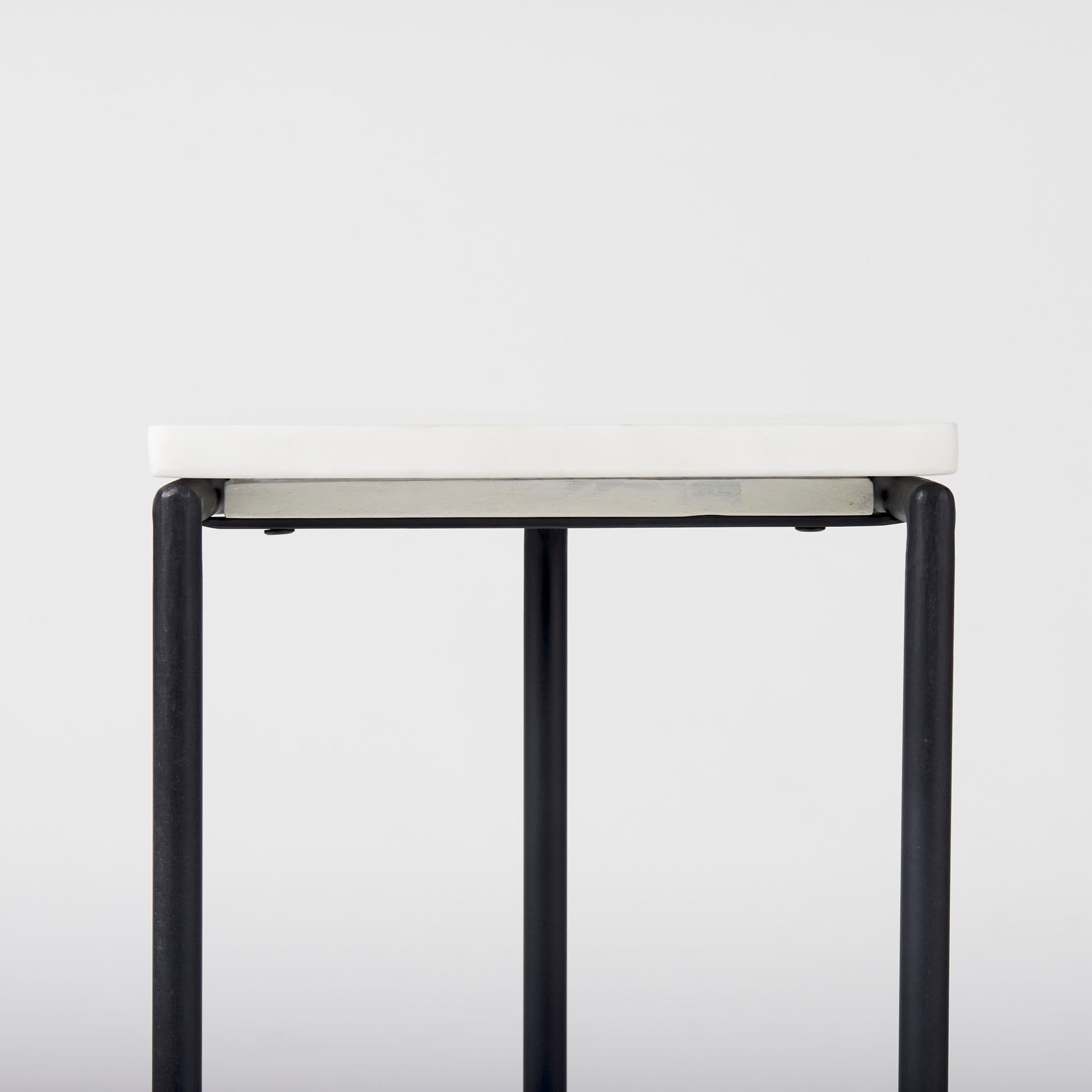 Kyra 12.0L x 20.0W x 23.0H White Marble Top W/Black Iron Frame C-Shaped End and Side Table — product photograph