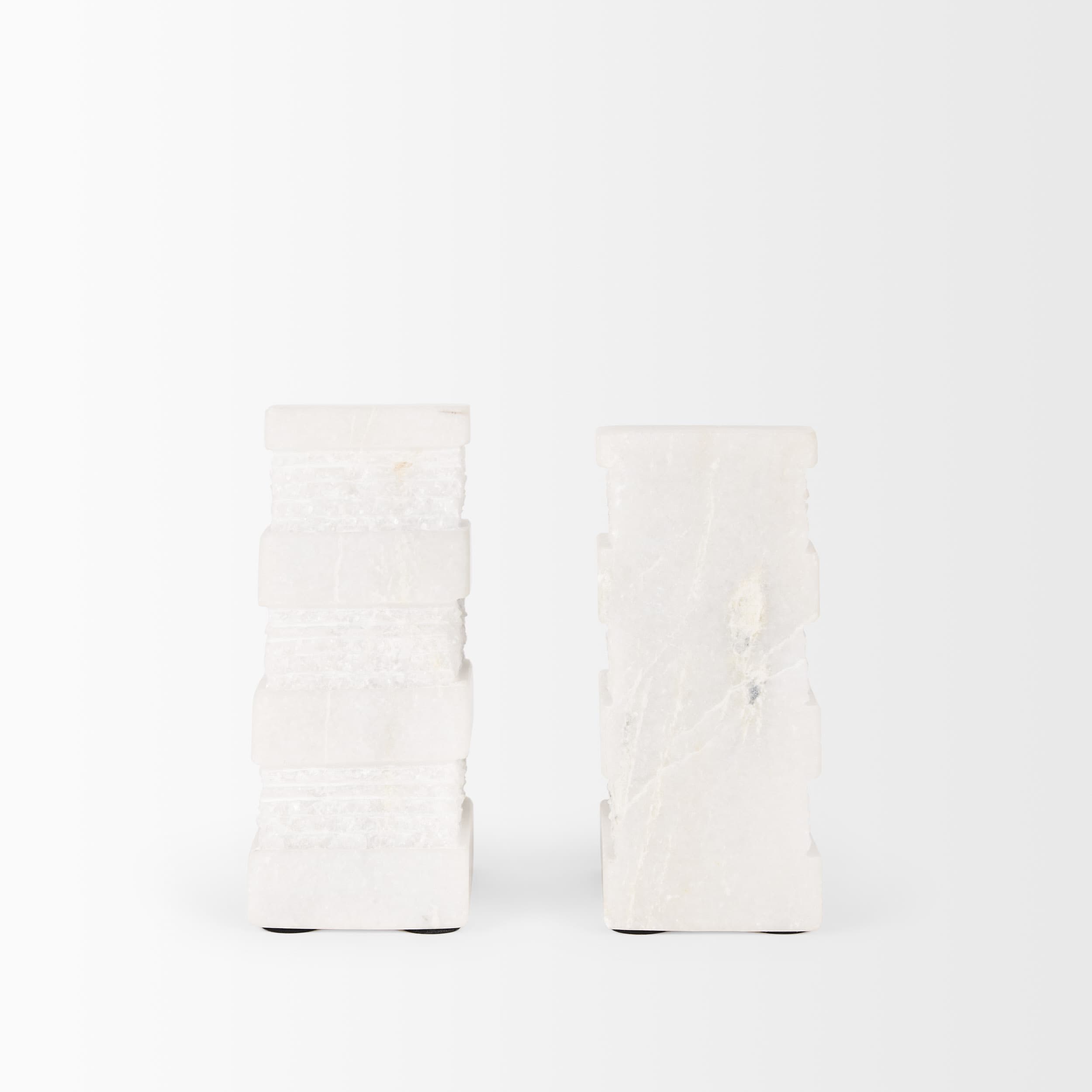 Cavetto White Marble Bookends w/rough carving S/2 — product photograph
