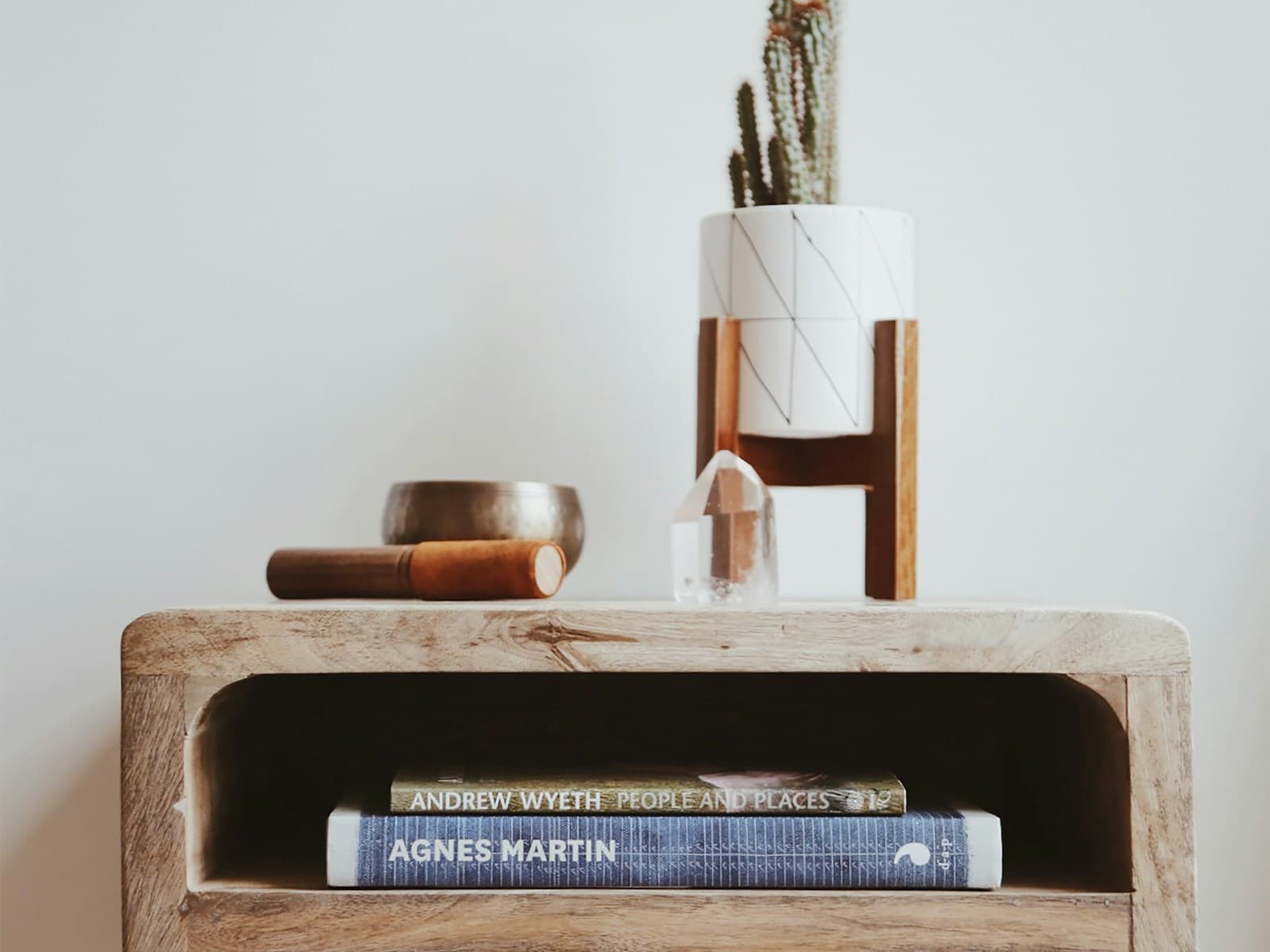 Cormier travertine coffee table on a wool rug