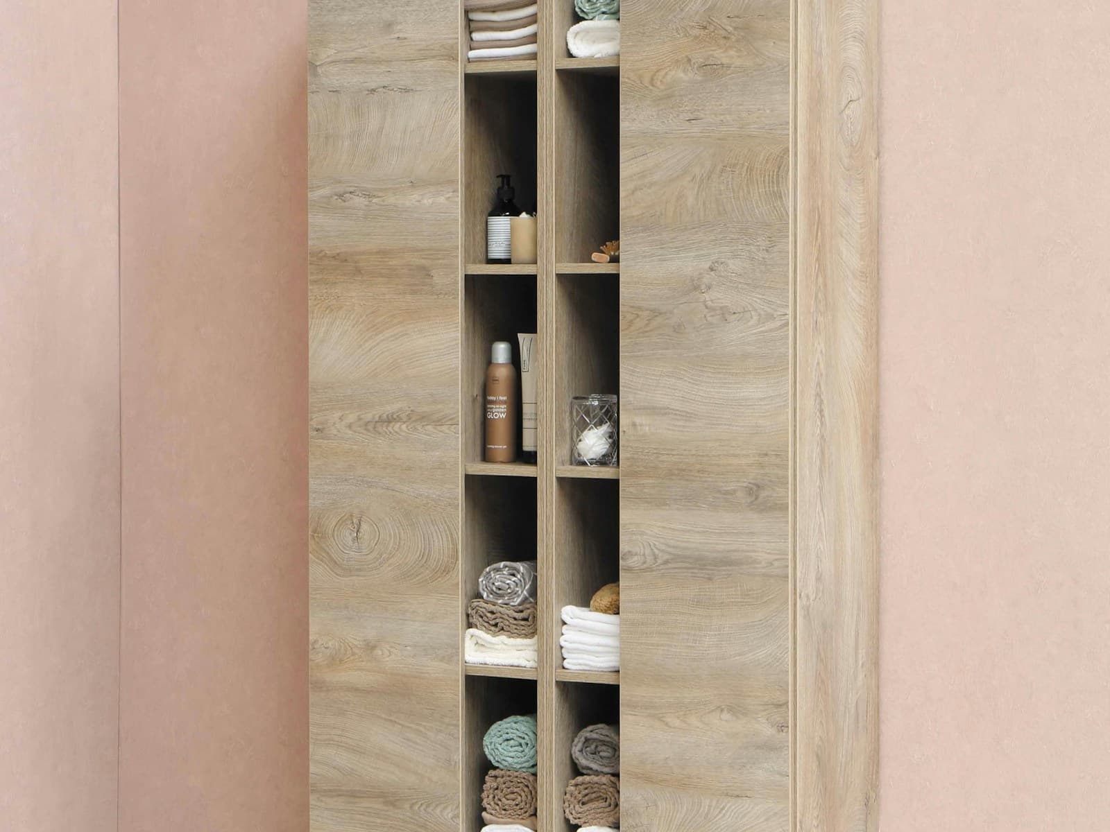 Bayview nightstand in pale ash beside a made bed
