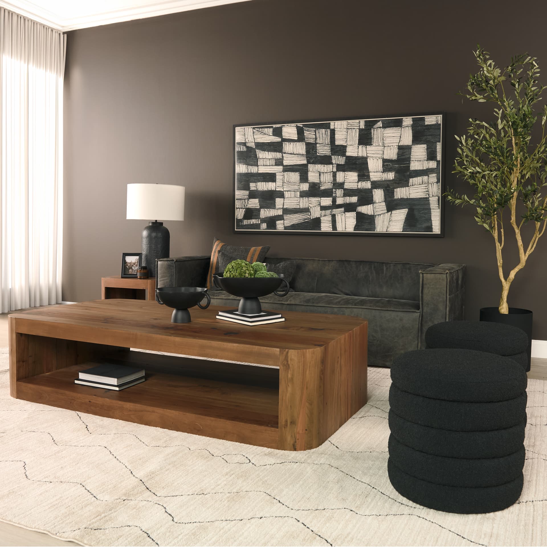 Dunmore Solid Wood Rectangular Open Shelf Coffee Table — in a styled room