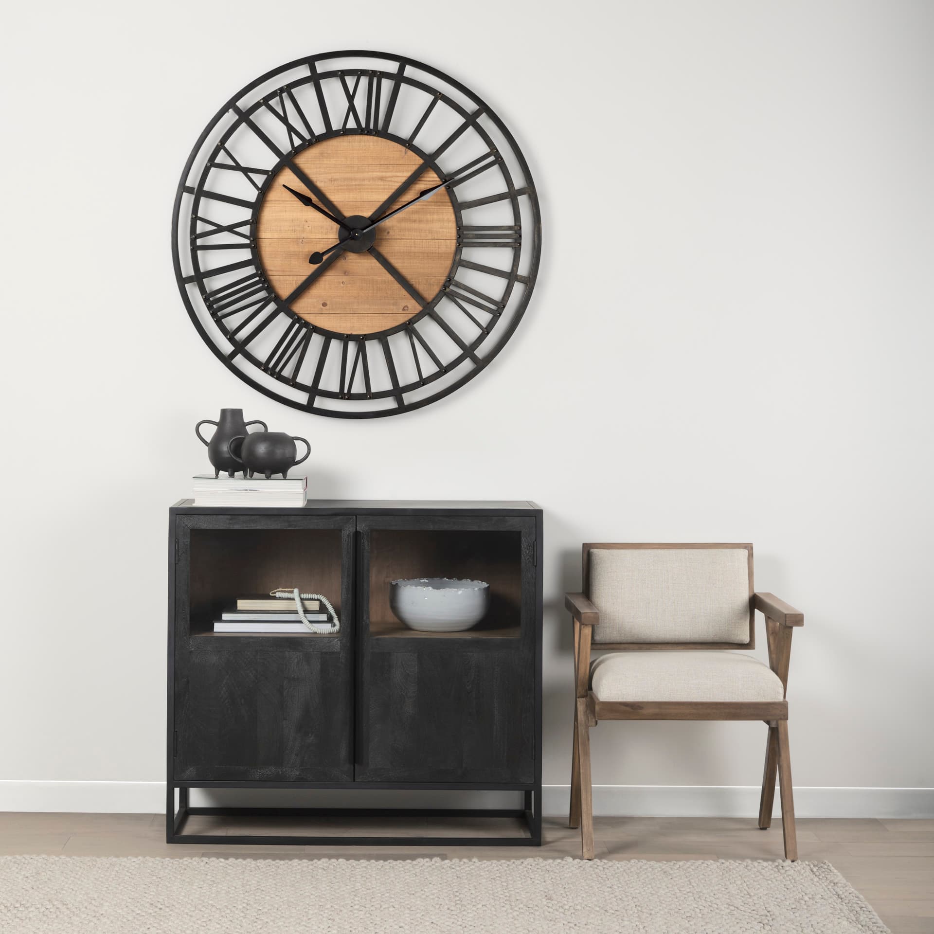 Lewiston 42.1L x 2.6W x 42.1H Black Iron W/Wood Round Wall Clock — in a styled room