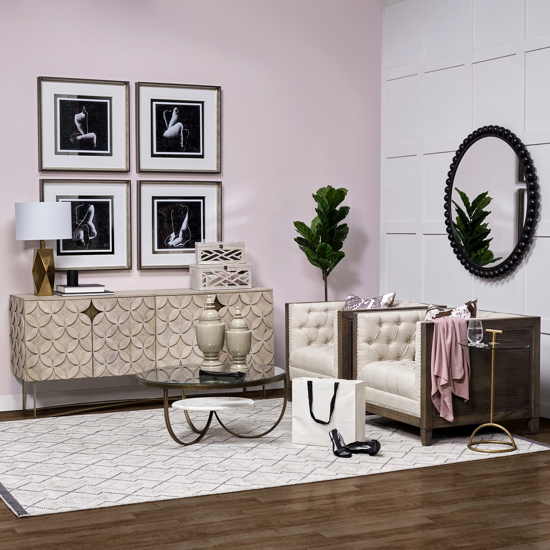 Orbit 43" Round Black Metal Ball Frame Mirror — in a styled room