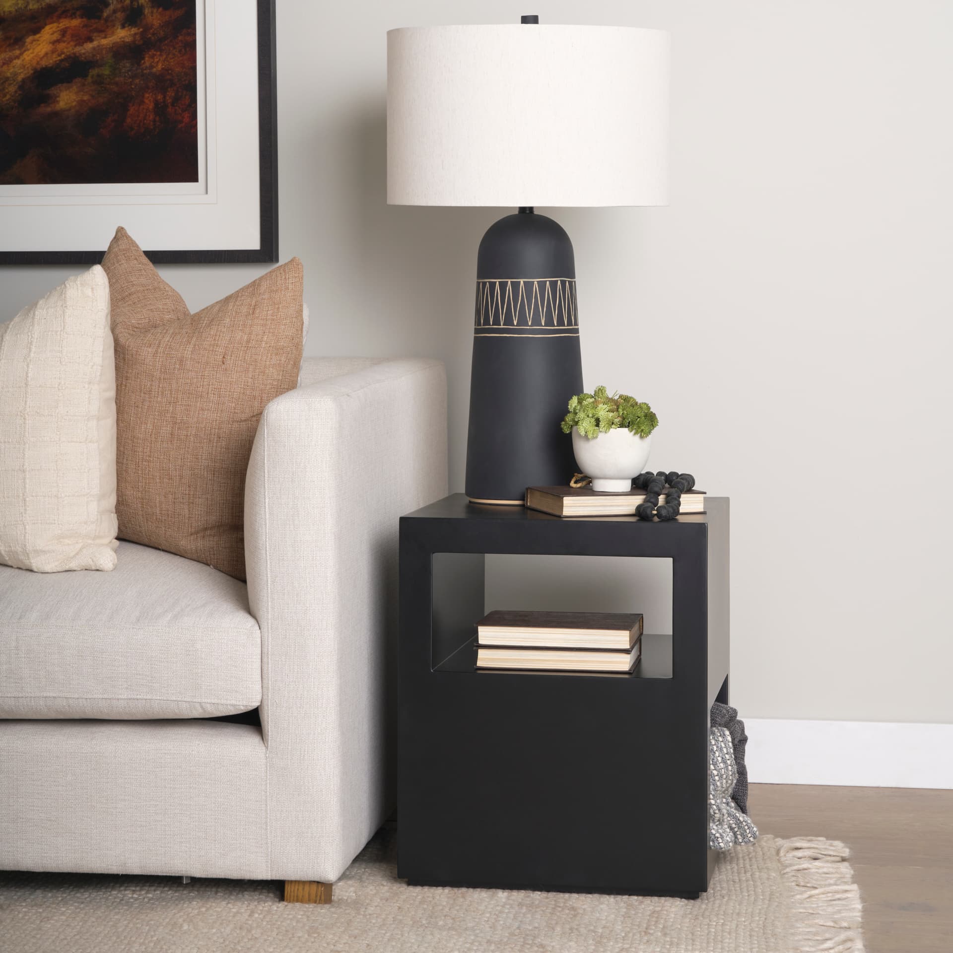 Vondra Matte Black Metal w/ Open Shelves Side table — in a styled room