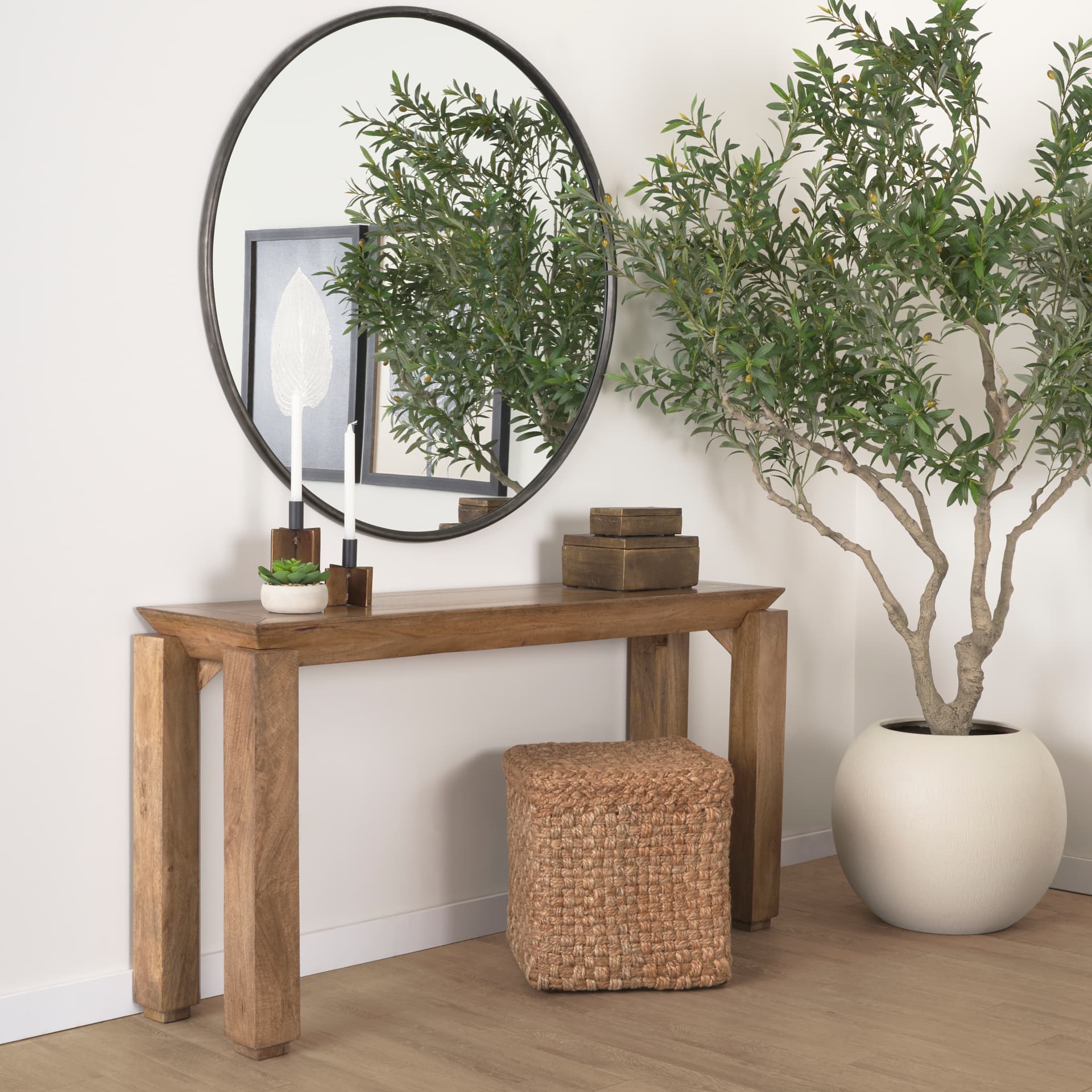 Aylin 16.5" Square Brown Jute Pouf — in a styled room