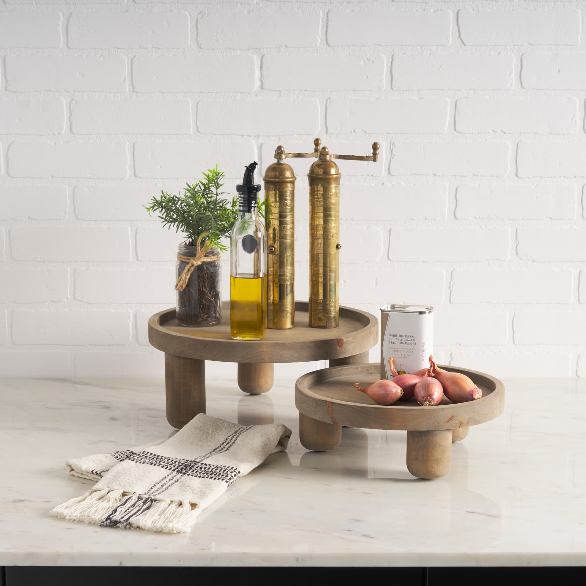 Virve Round Light Brown Wood w/ Gray Wash Wooden Trays — in a styled room