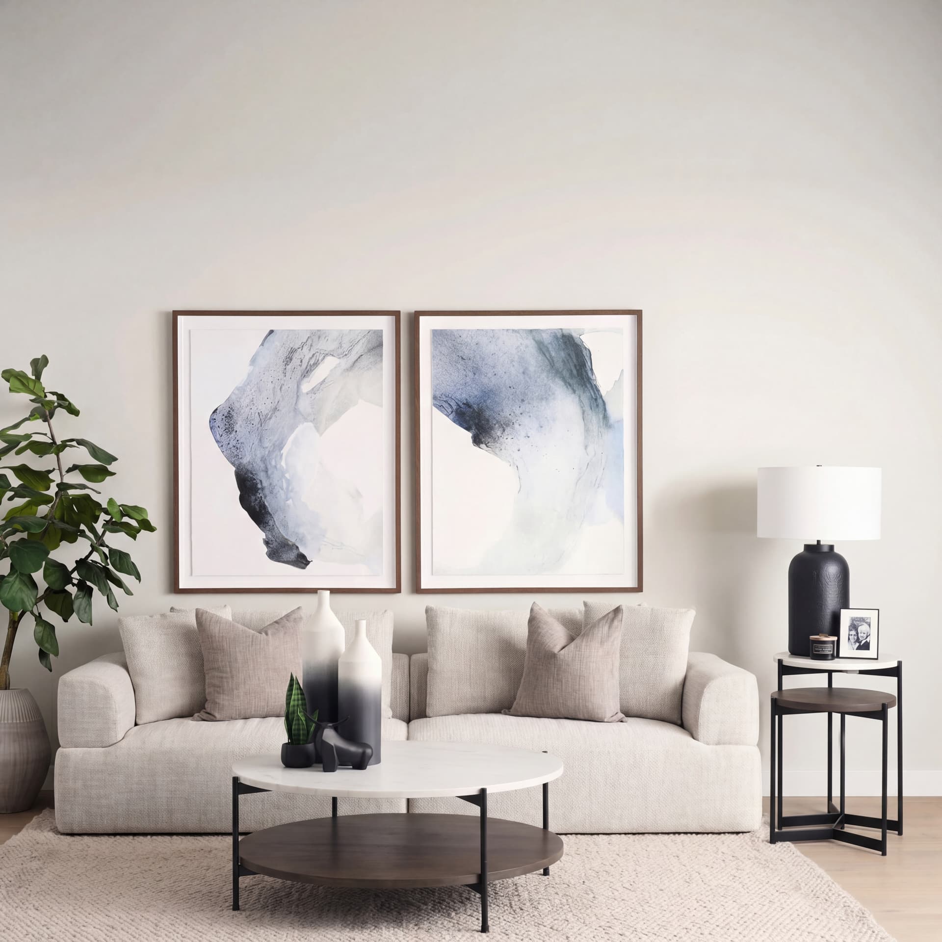 Larkin 42" Round Two-Tier White Marble Top and Solid Wood Shelf w/ Black Metal Frame Coffee Table — in a styled room