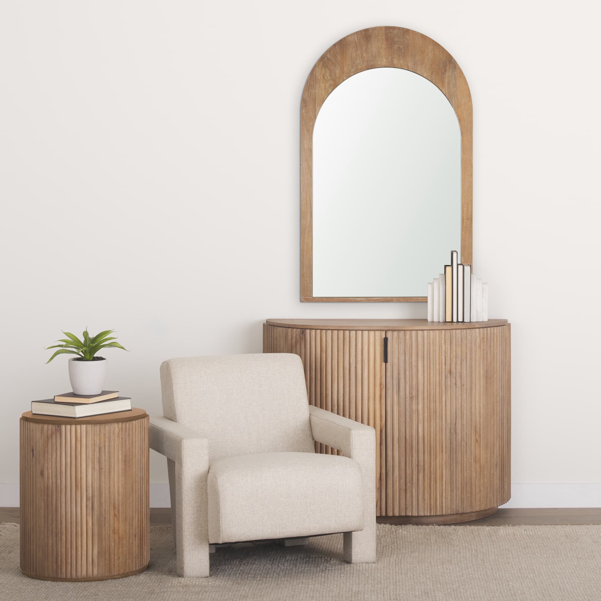 Celeste Light Brown Wood Medium Arched Mirror — in a styled room