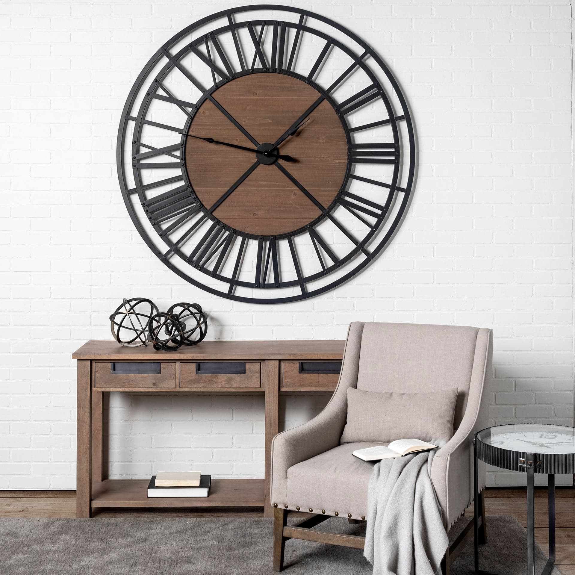 Galenna II (Medium) 9L x 9W Black Metal Circular Decorative Orb — in a styled room