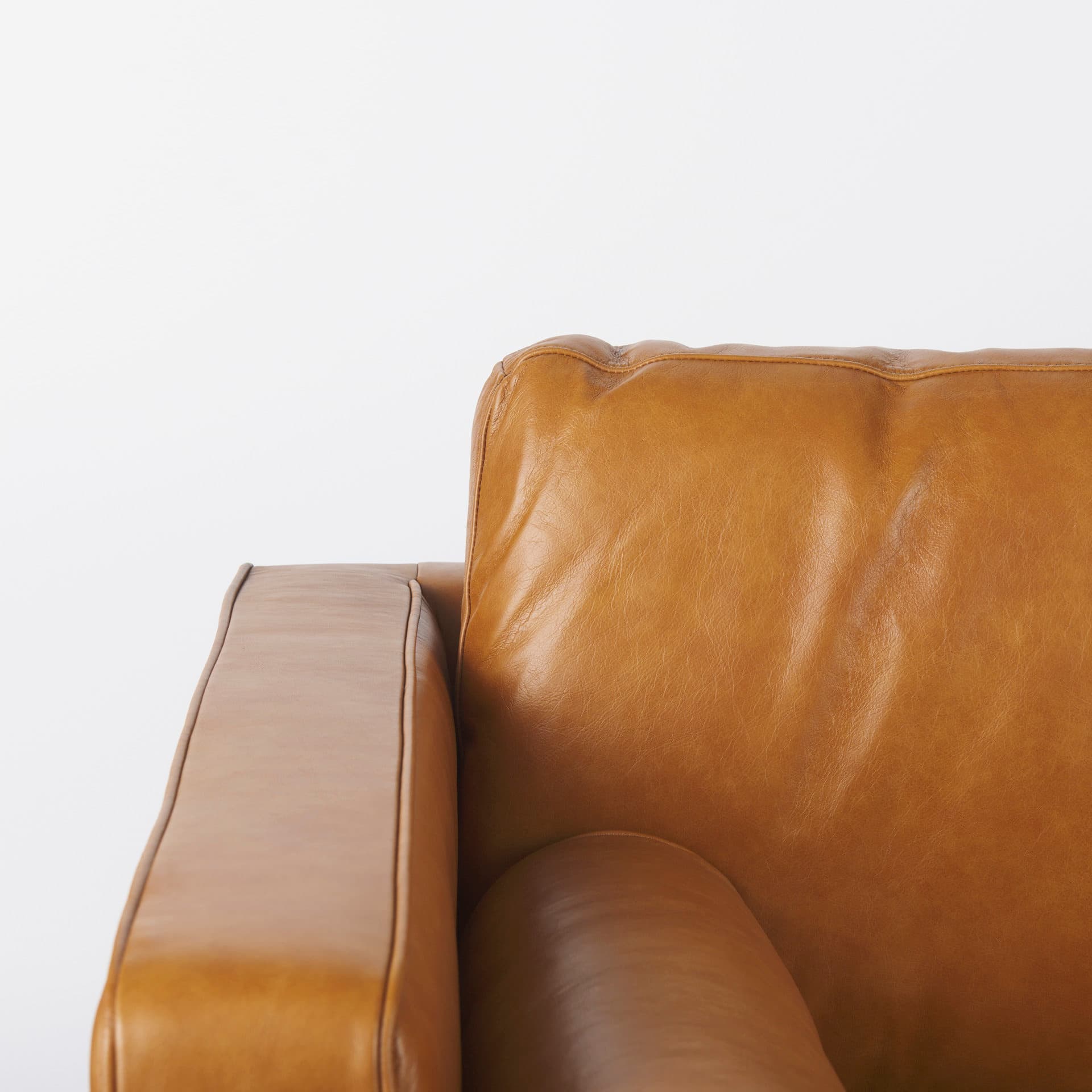 Svend 65.0L x 38.0W x 34.0H Tan Leather Love Seat Sofa — product photograph
