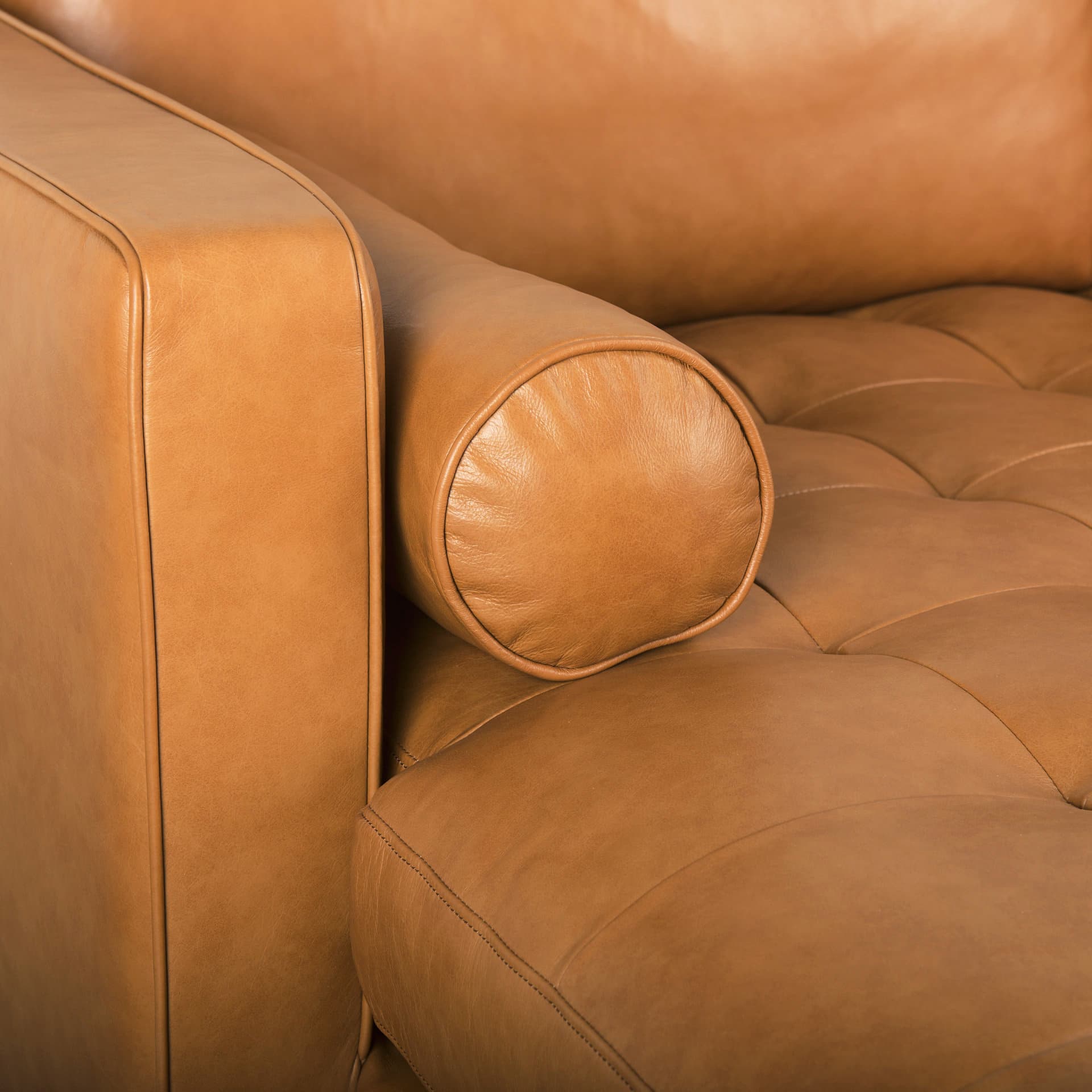 Svend 111.4L x 68.0W x 33.9H Tan Leather Left Chaise Sectional Sofa — product photograph