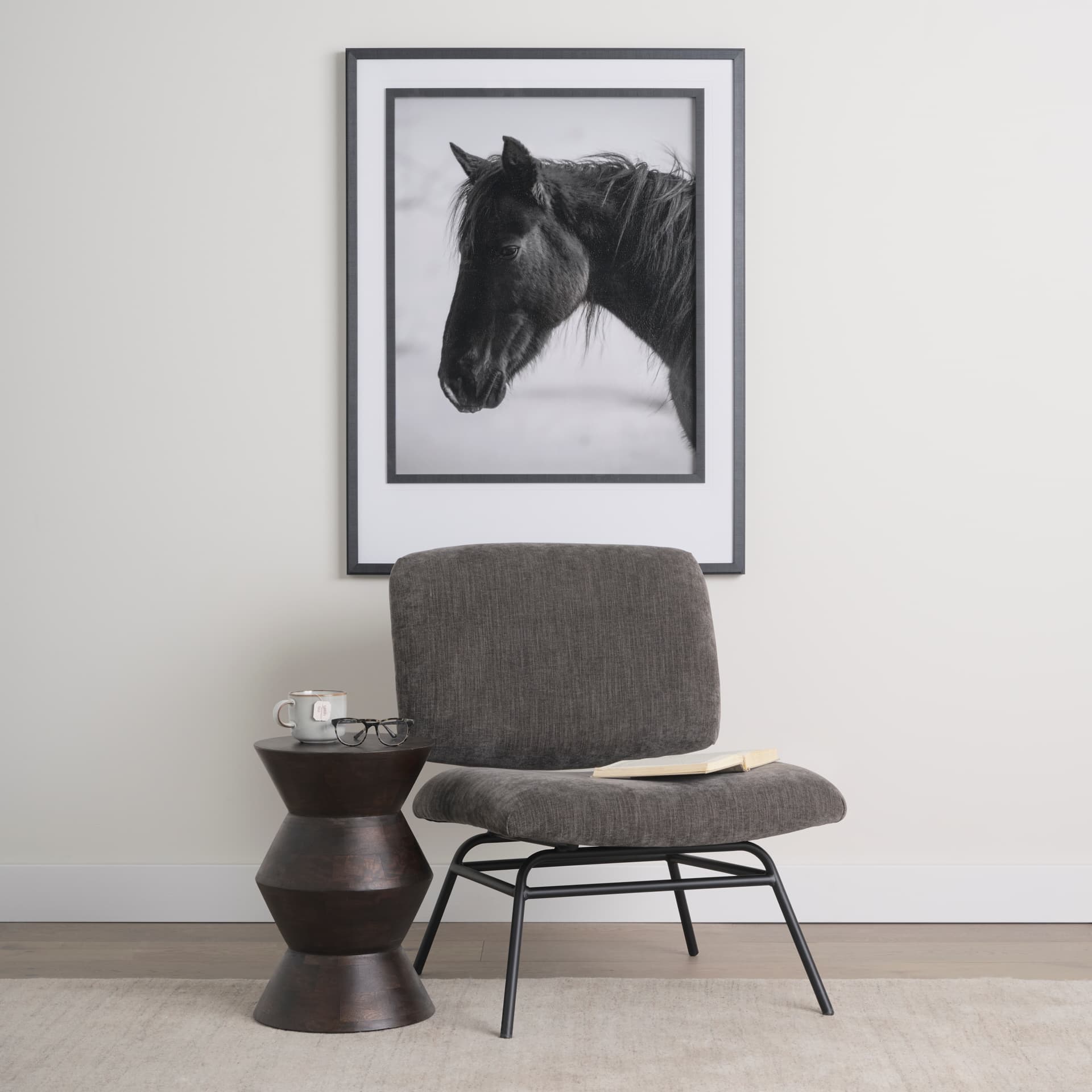 Nora Charcoal Fabric w/ Matte Black Metal Legs Accent Chair — in a styled room