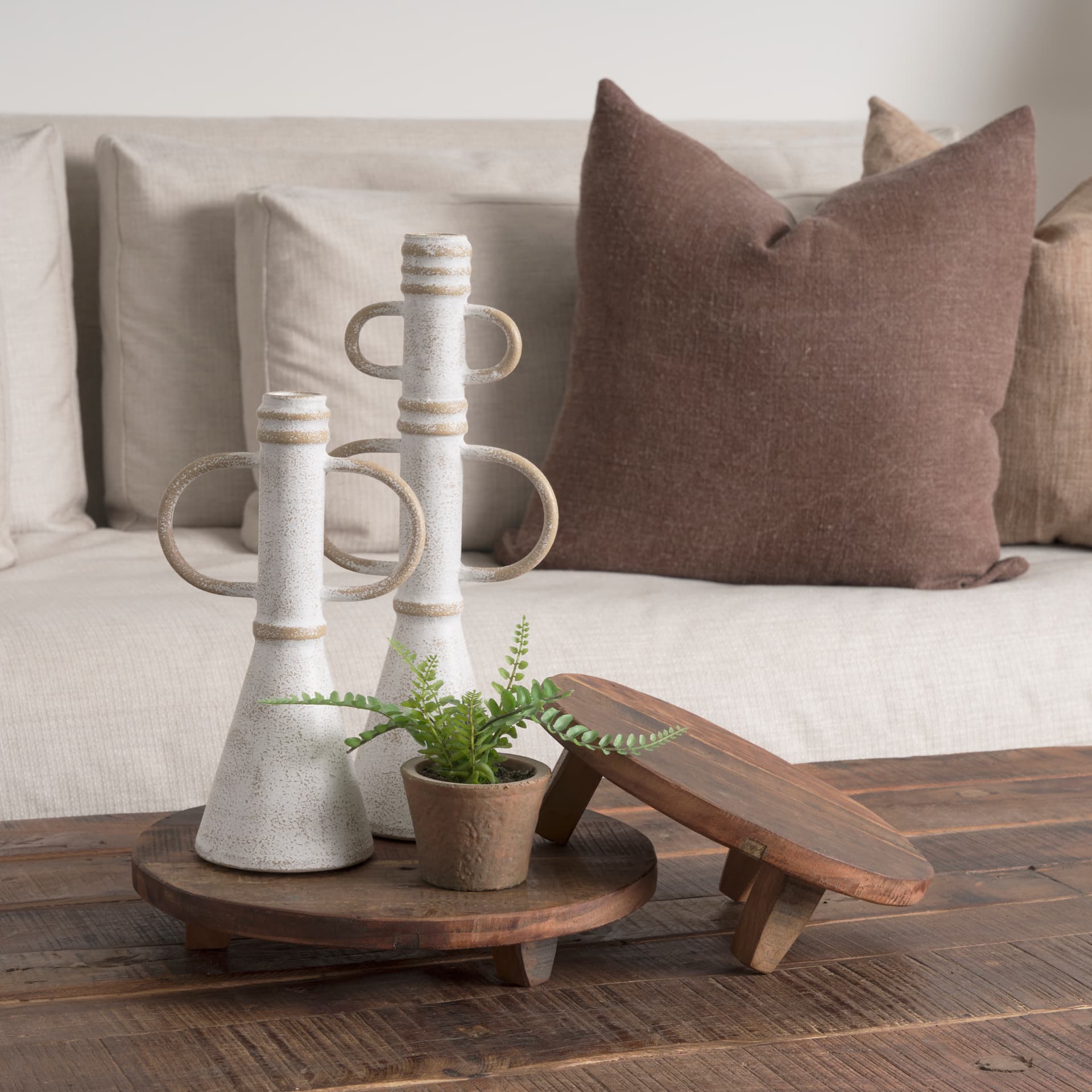 Iza Medium Brown Wooden Riser (Set of 2) — in a styled room