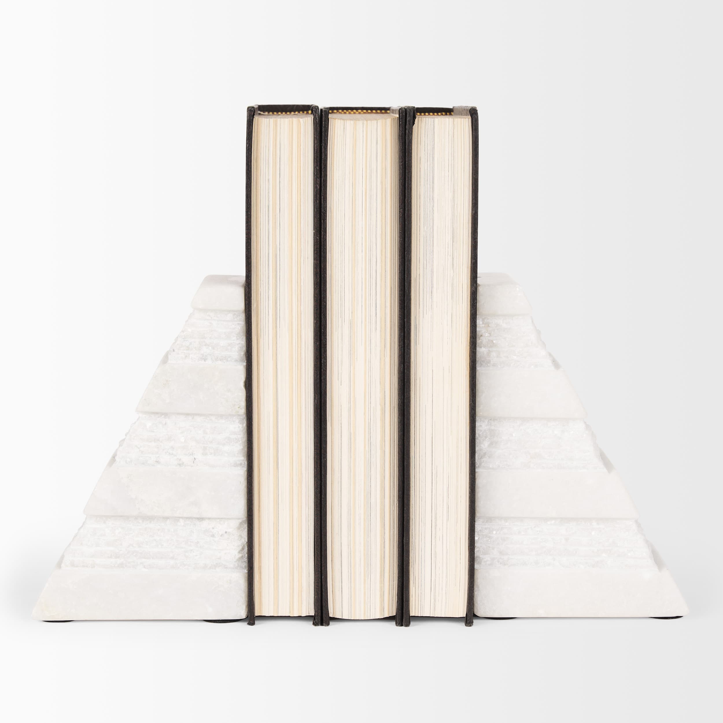 Cavetto White Marble Bookends w/rough carving S/2 — product photograph