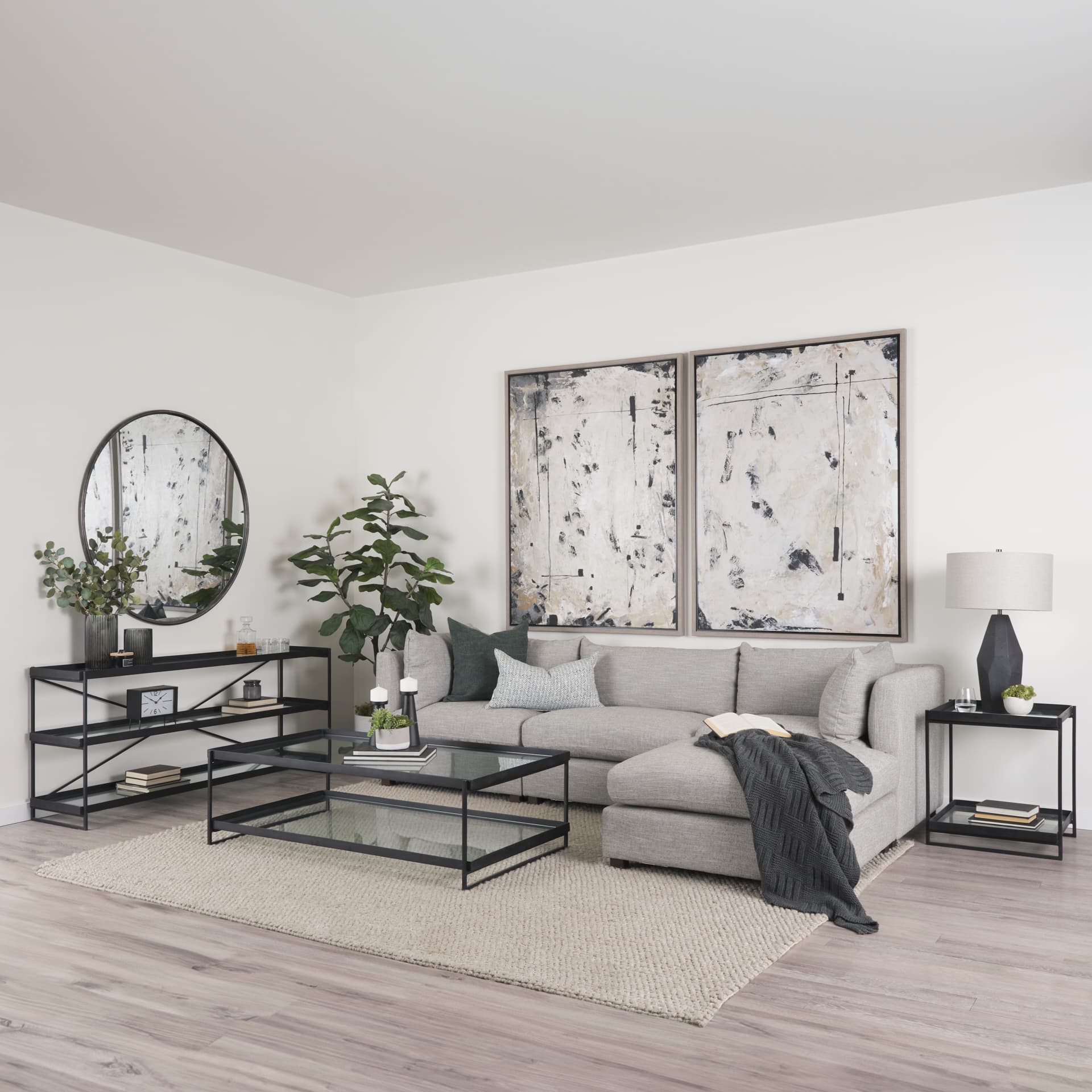 Trey 72.0"L x 16.0"W x 30.0"H Black Metal W/Glass Console Table — in a styled room