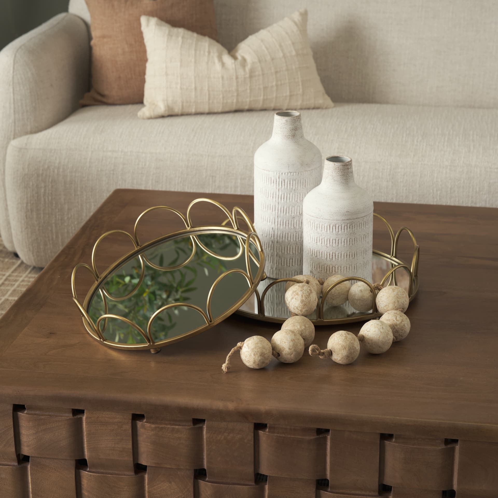 Lenore Round Metal/Mirror Tray Gold (Set of 2) — in a styled room