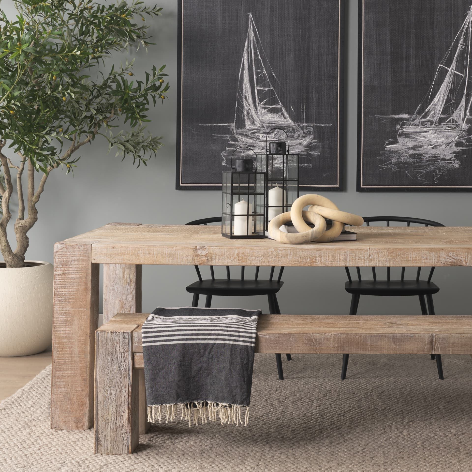 Alize Solid Wood Circular Chain Link Decorative Object — in a styled room