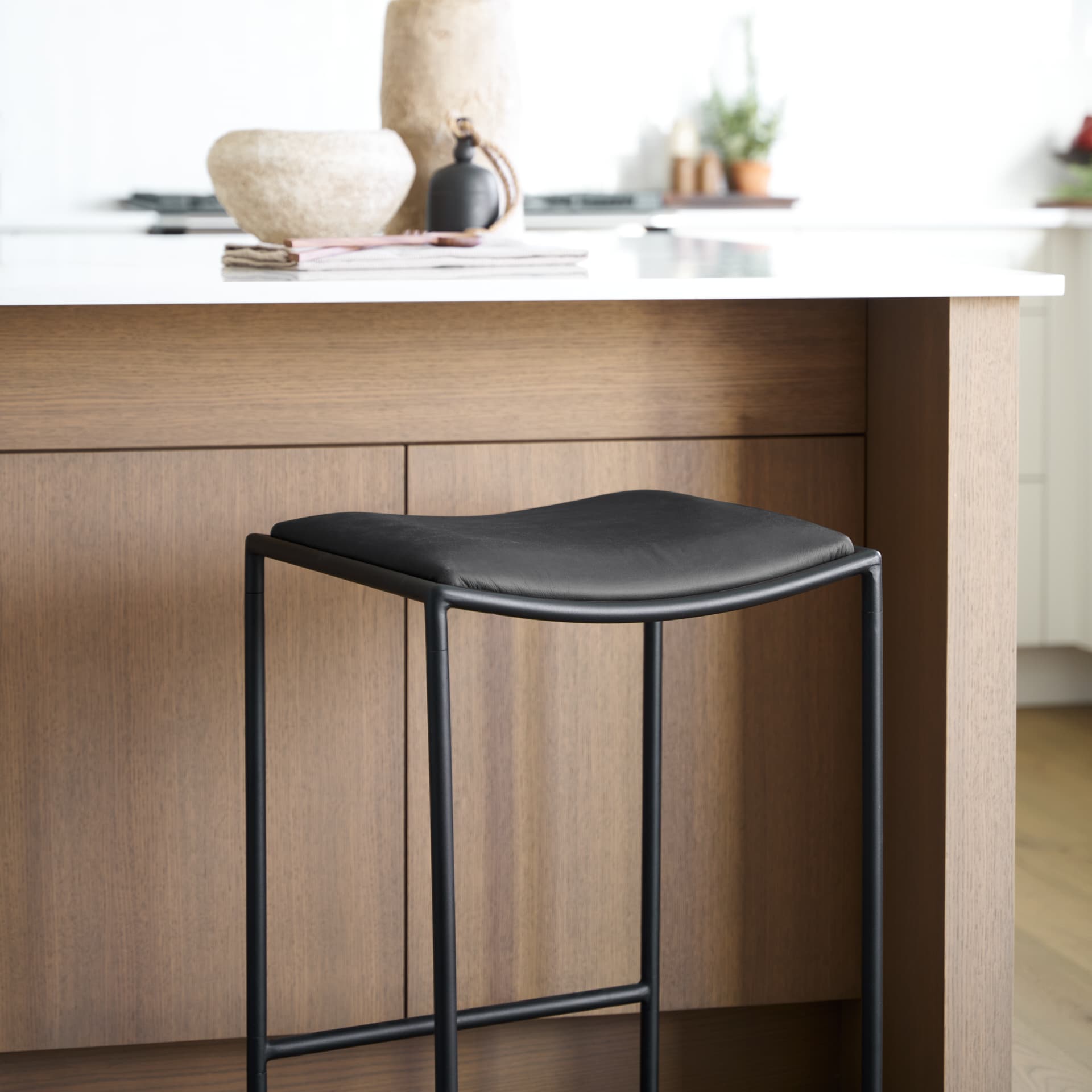 Taniel Backless 27.25in Seat Counter Stool | Black Leather w/ Metal — product photograph