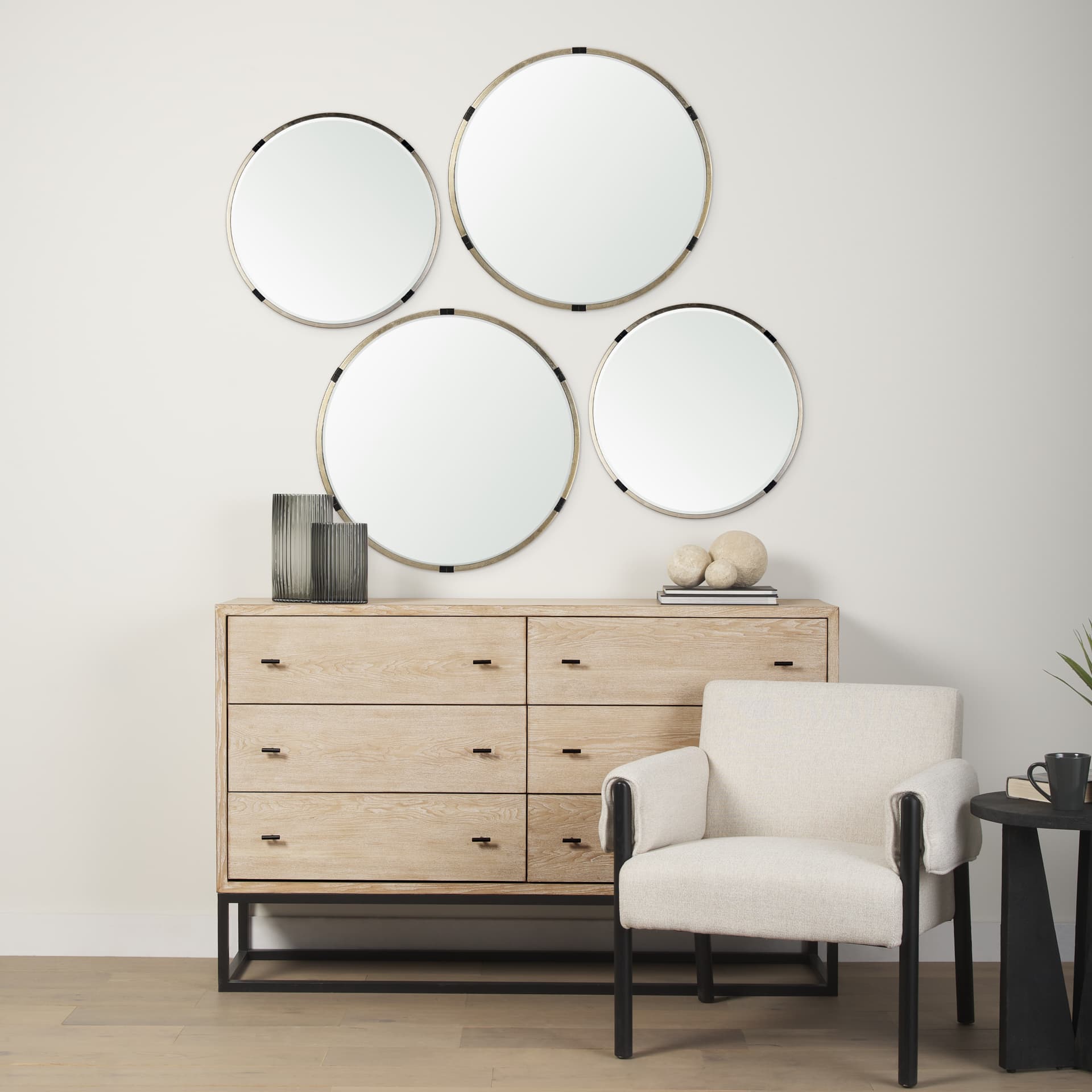 Melissa 23" Small Round Gold Metal Wall Mirror — in a styled room