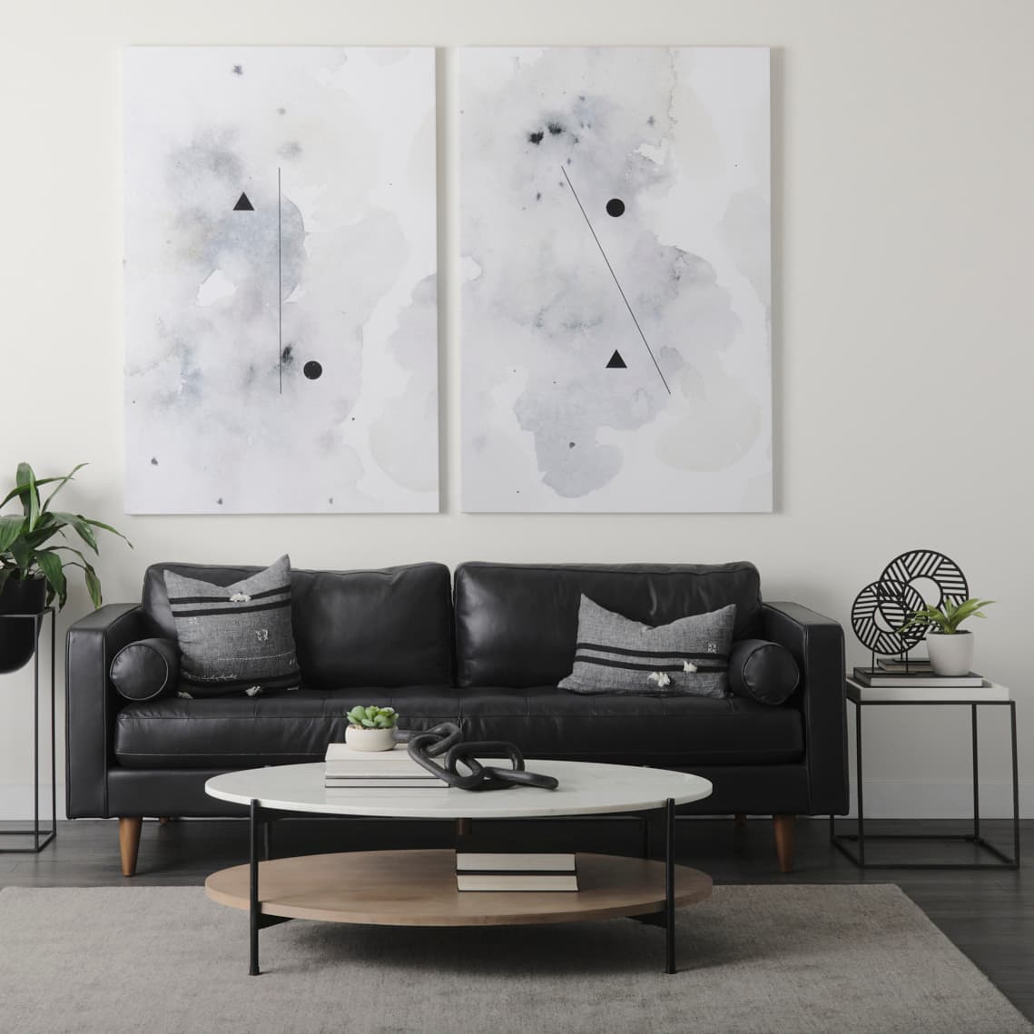 Micra 11.0L x 3.0W x 13.4H Matte Black Metal Decorative Object on a Stand — product photograph