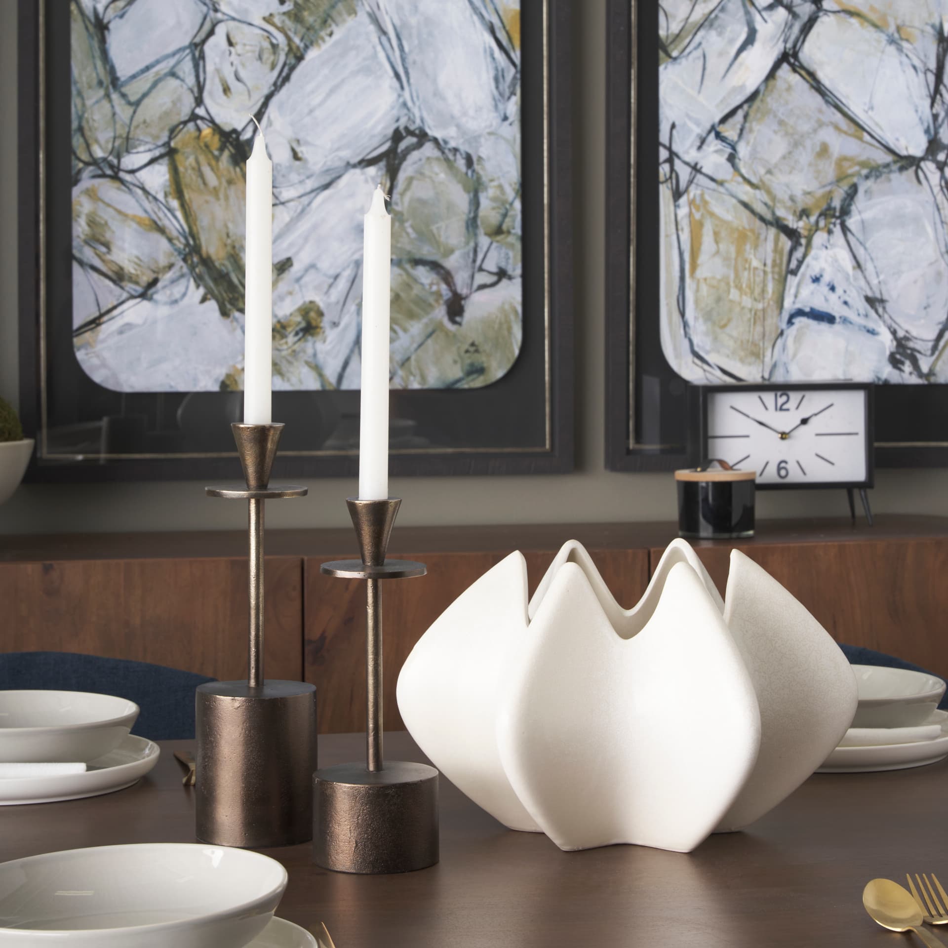 Petria Antiqued Gold Textured Metal Taper Candle Holders — in a styled room