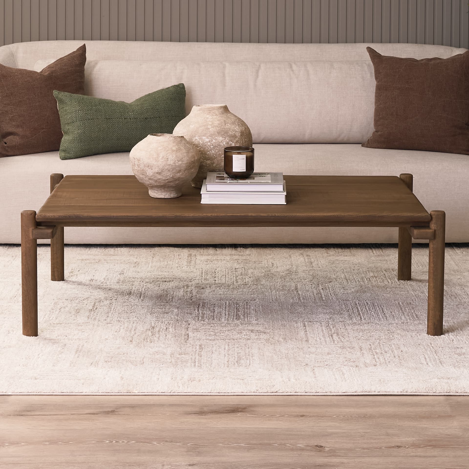 Riven Oak Wood Rectangular Coffee Table — in a styled room