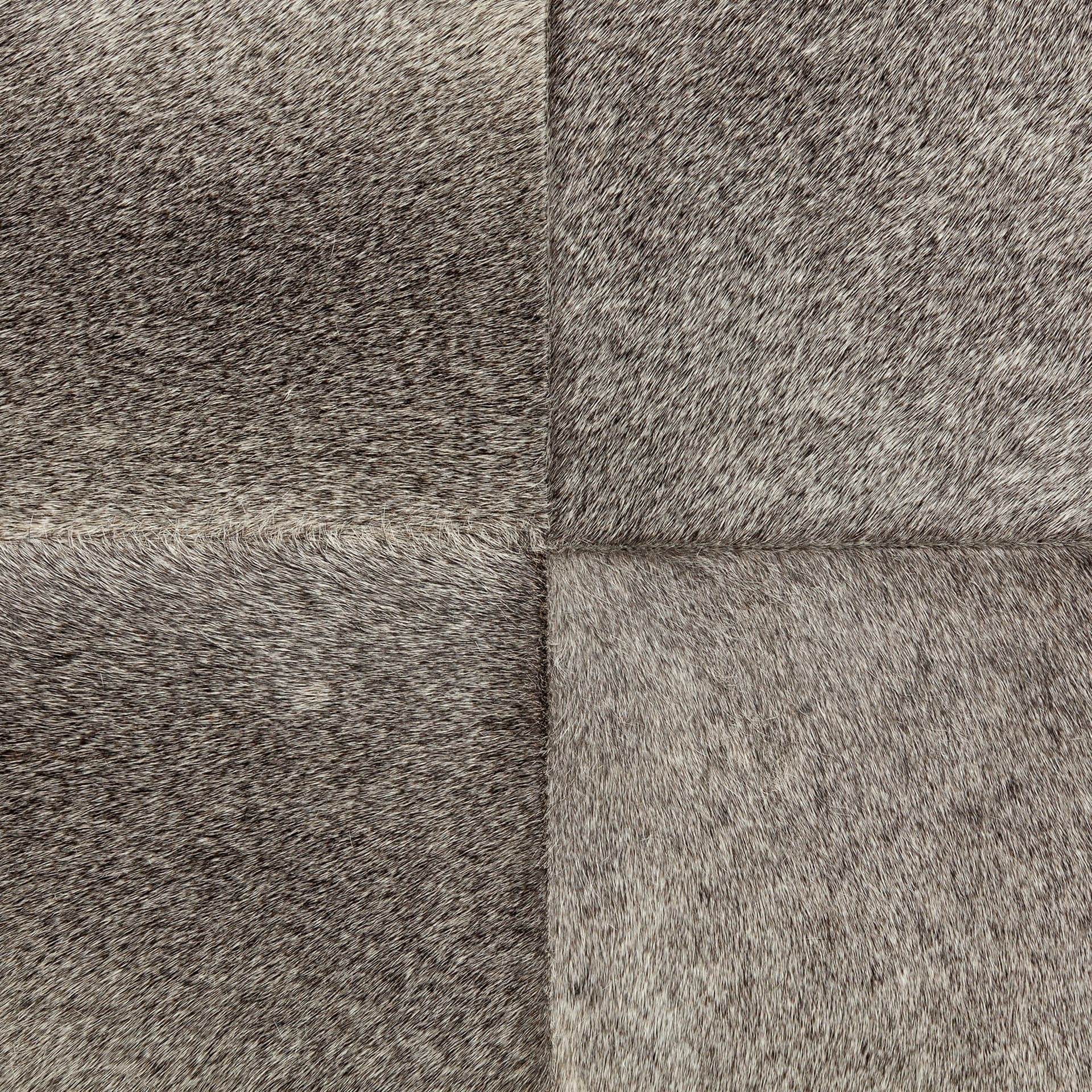 Zahavi I 23"H grey-toned hair-on-hide ottoman — product photograph