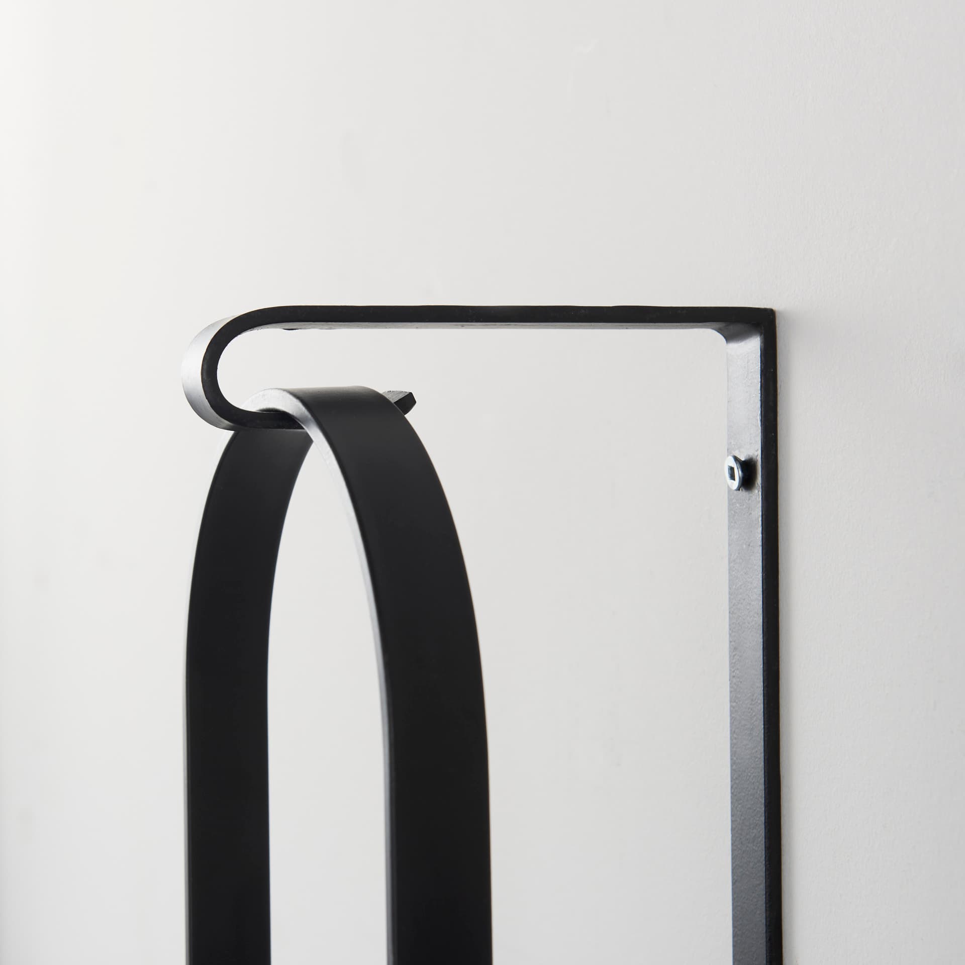 Kero 5.9L x 6.9W x 24.0H Black Metal Wall Candle Holder — product photograph