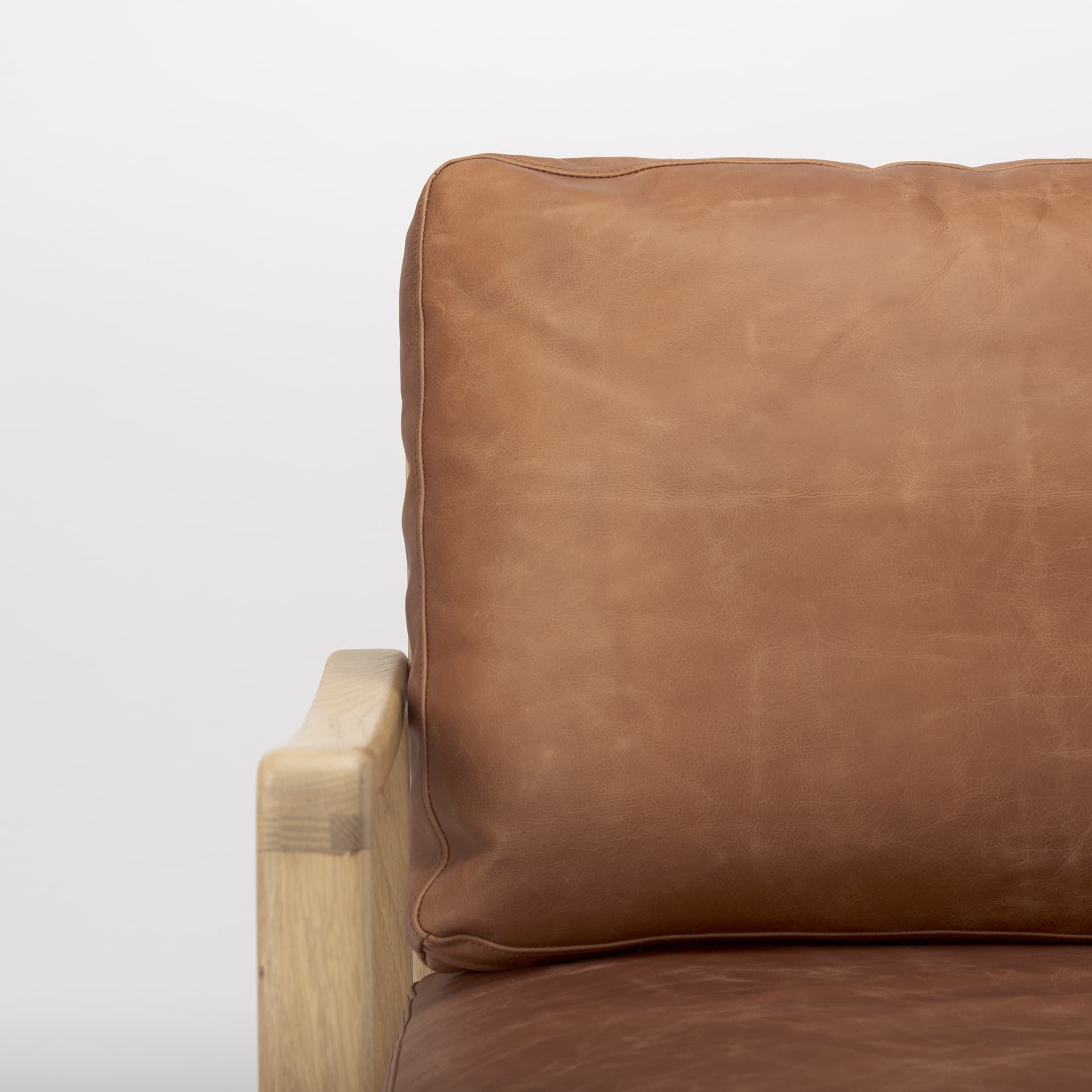 Raeleigh 28.0L x 34.1W x 34.4H Cognac Leather W/ Light Brown Wood Frame Accent Chair — product photograph