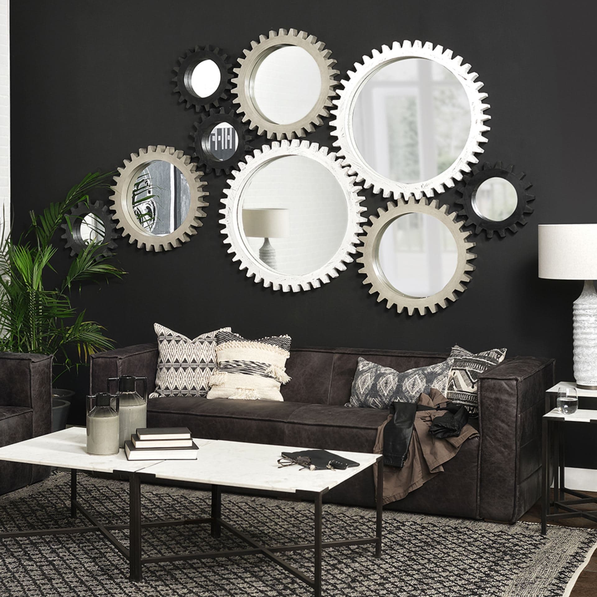 Sundance Cog 26" Round Grey Wood Frame Mirror — in a styled room