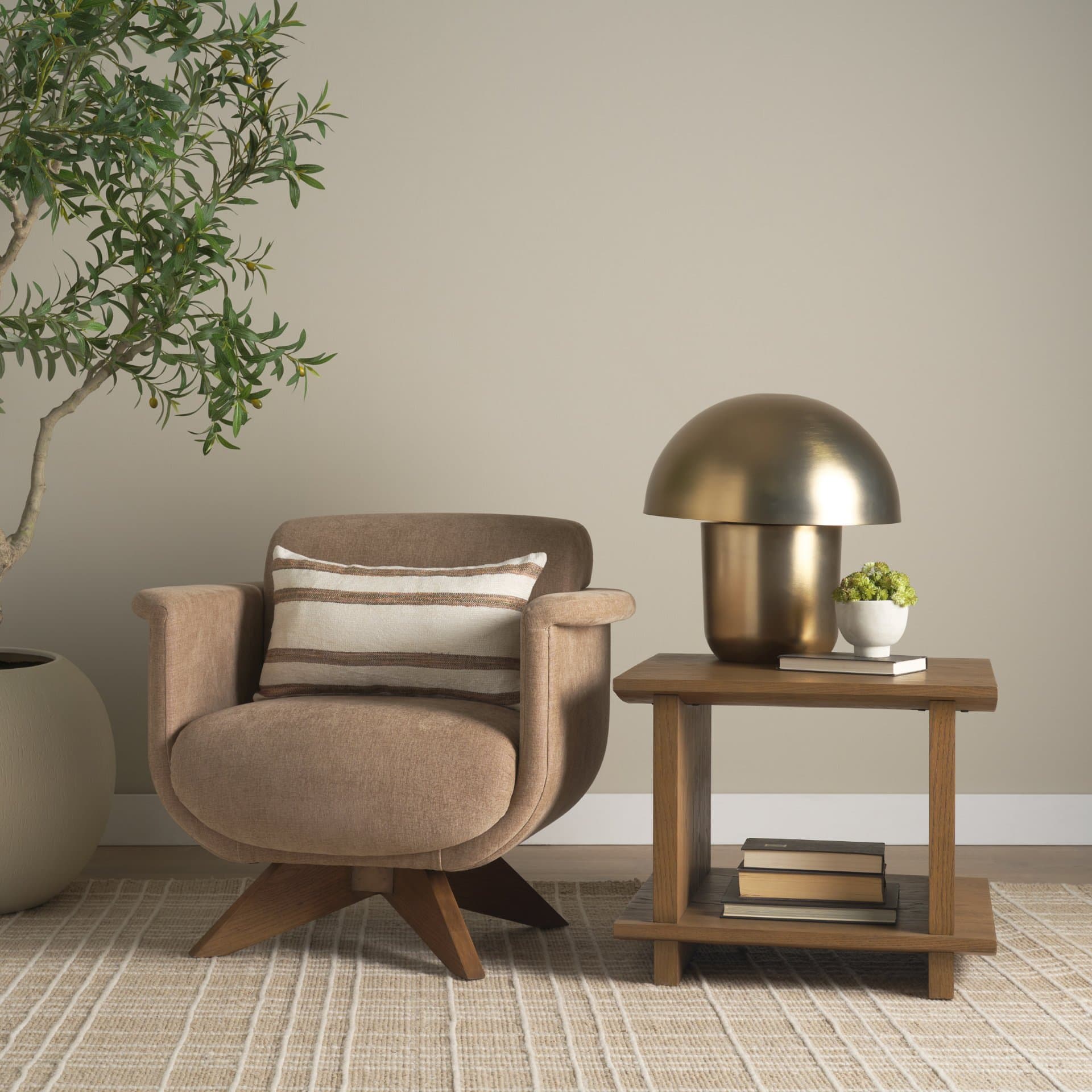 Oskar Chocolate Fabric w/ Brown Wood Base Swivel Accent Chair — in a styled room