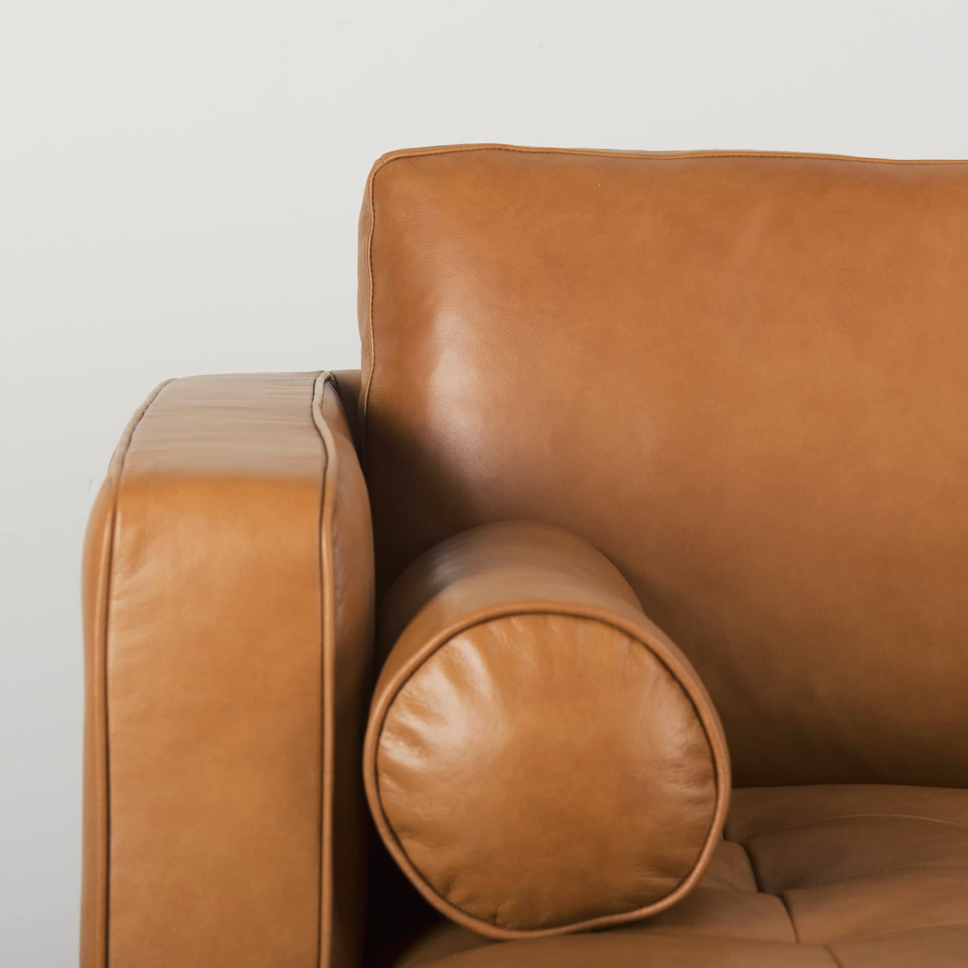 Svend 111.4L x 68.0W x 33.9H Tan Leather Right Chaise Sectional Sofa — product photograph