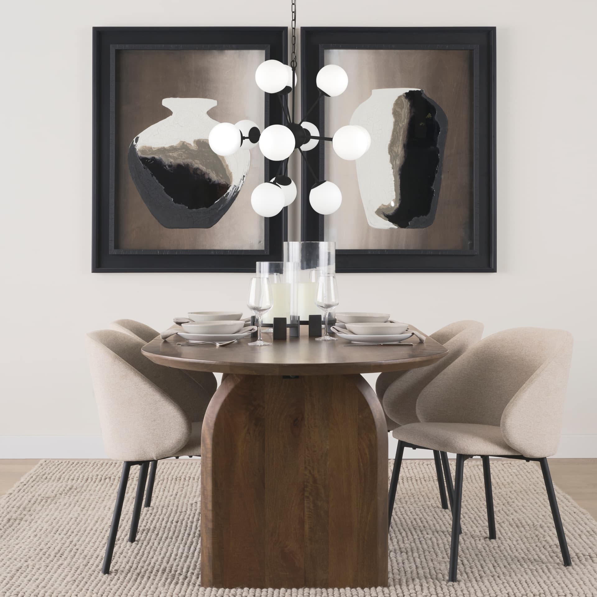 Barbara Matte Black Metal w/ Frosted Glass Globes 11-Light Chandelier — in a styled room