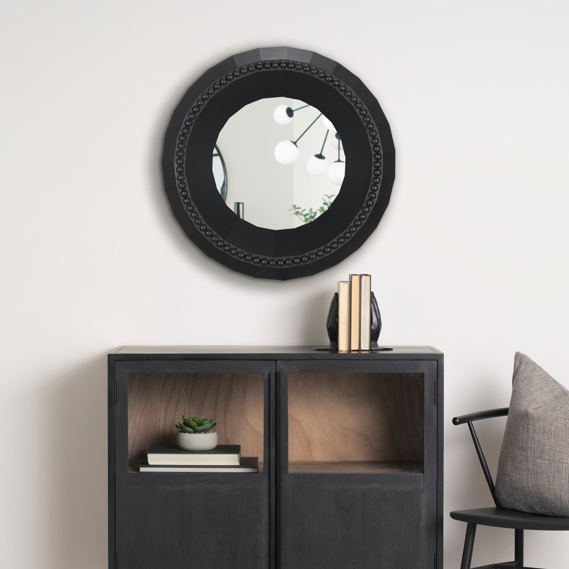 Ranela Black Beaded Wooden Wall Mirror — in a styled room