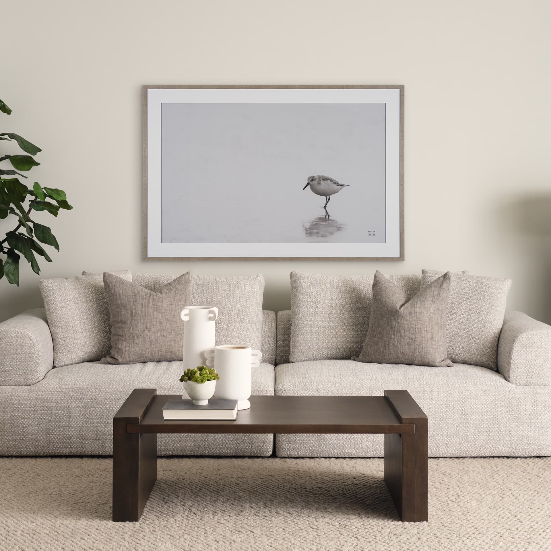 Tybee Island Sanderling by Nathan Larson a Hand Embellished Framed Photo Print under Glass — in a styled room
