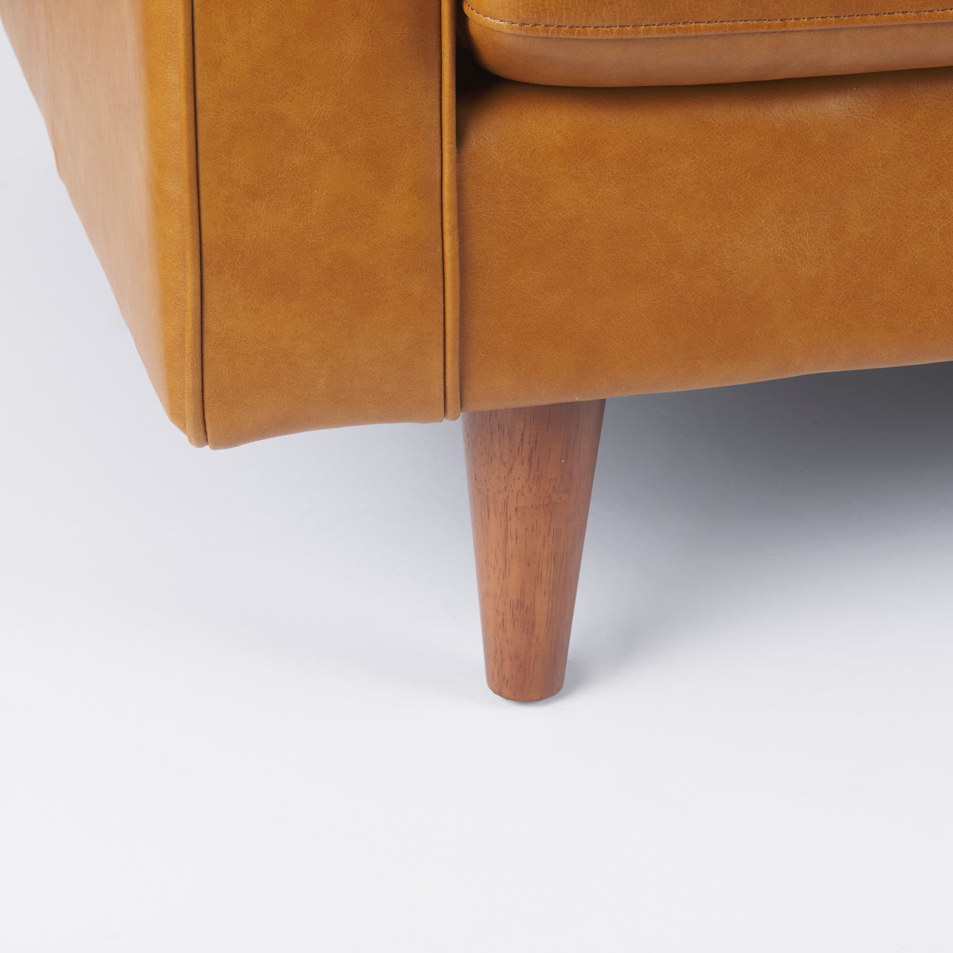 Svend 65.0L x 38.0W x 34.0H Tan Leather Love Seat Sofa — product photograph