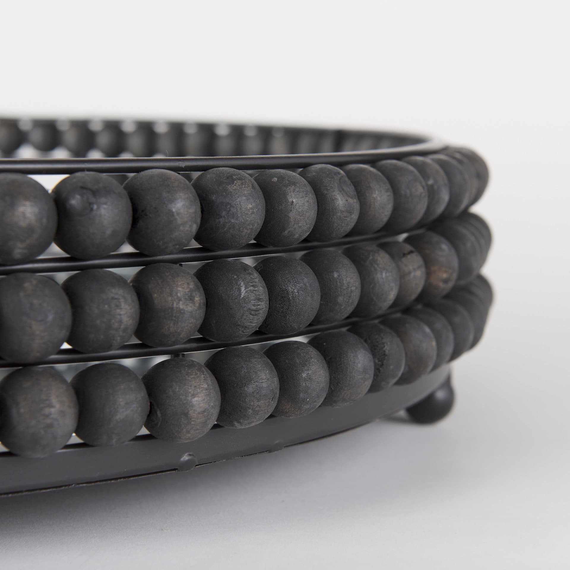 Decatur II 21L x 21W Black Wooden Bead Mirrored Bottom Round Tray — product photograph