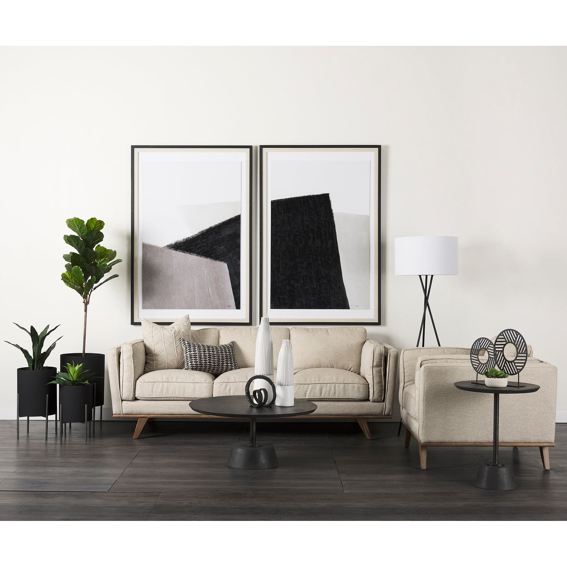 Micra 11.0L x 3.0W x 13.4H Matte Black Metal Decorative Object on a Stand — in a styled room