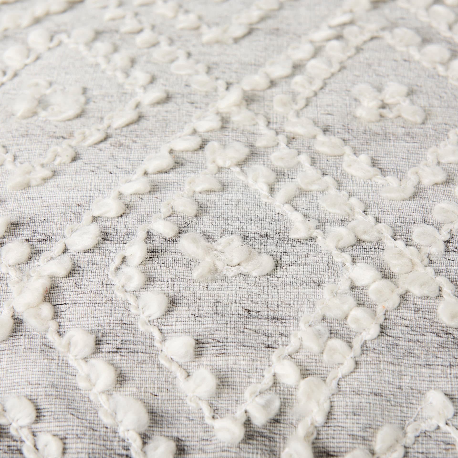 Farida 6.0L x 16.0W x 16.0H Light Gray Wool and Polyester Patterned Pouf — product photograph